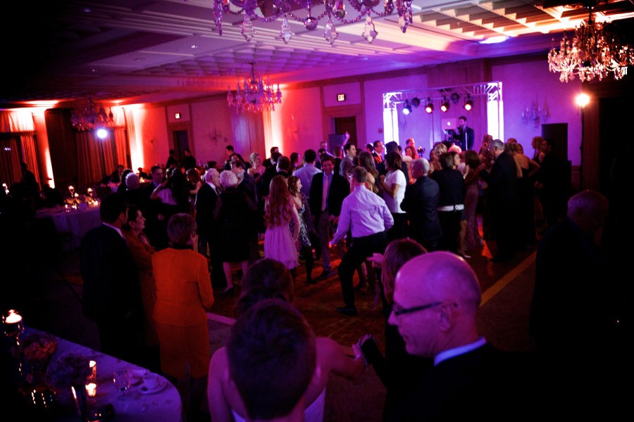 Crowd reacting as music peaks at a wedding celebration