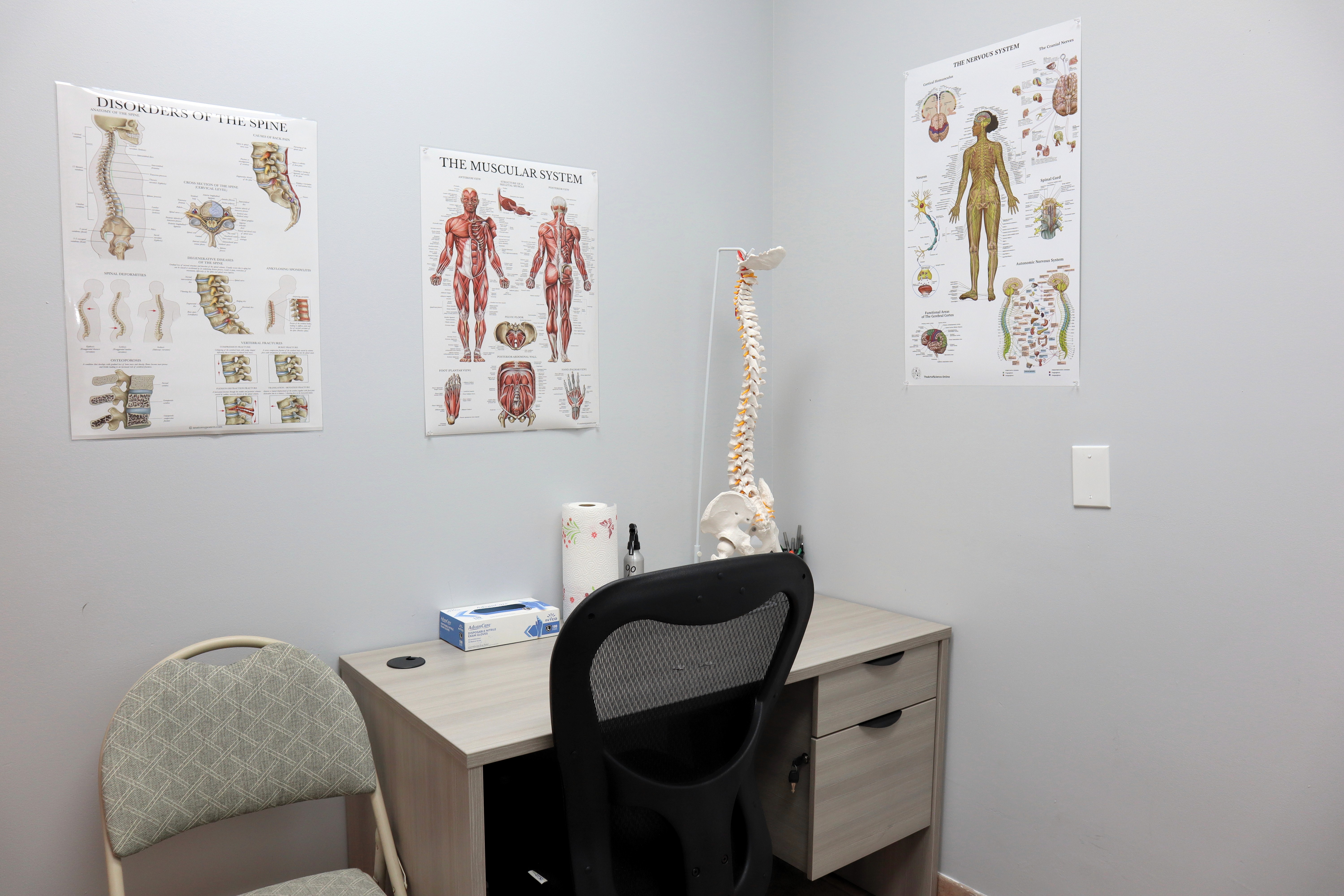 Old woman laughing with her doctor