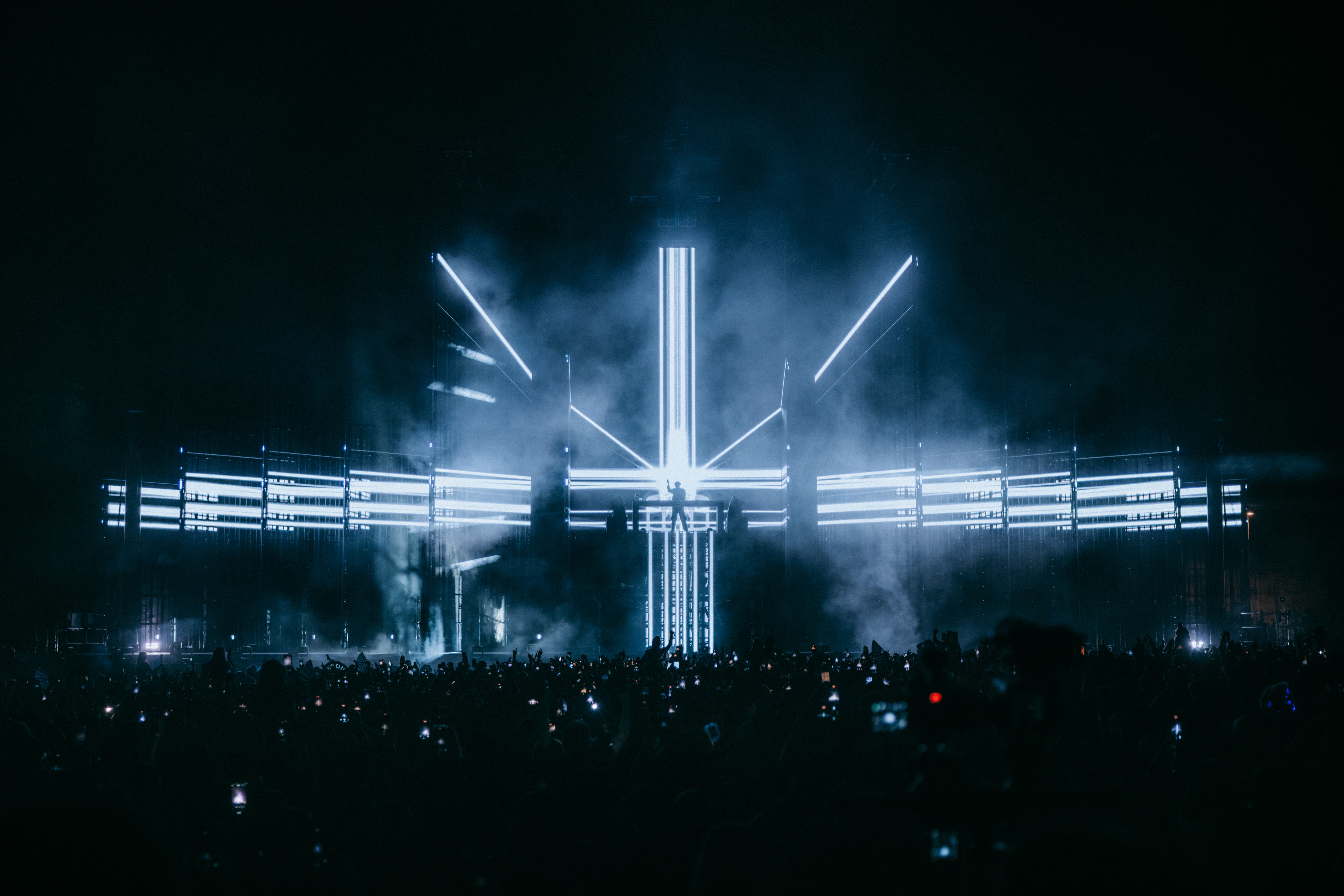 Crowd silhouettes beneath Dom Dolla’s illuminated stage at LA State Historic Park, captured by Brandon Densley of A World Away