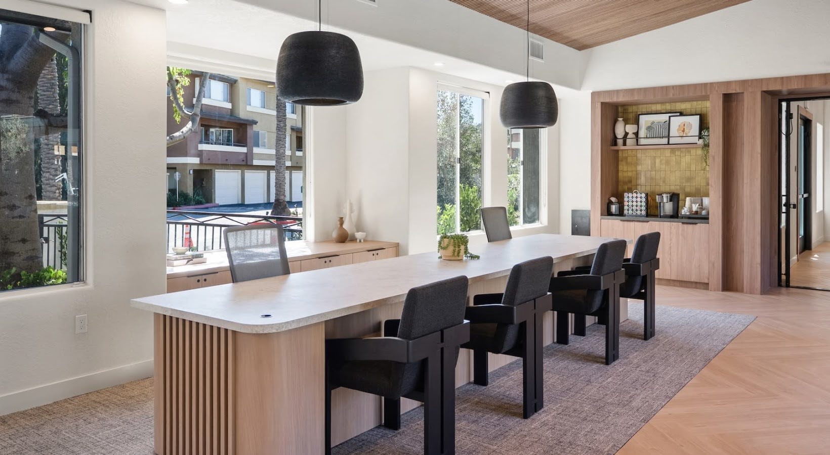 a white wall with a metal number two on it