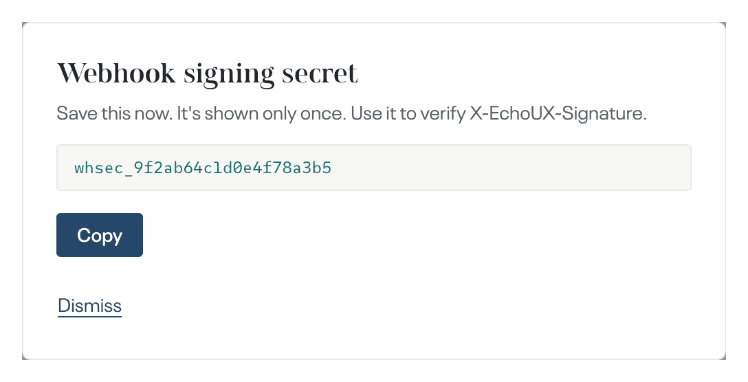the Webhook signing secret dialog · the secret shown once, with Copy and Dismiss
