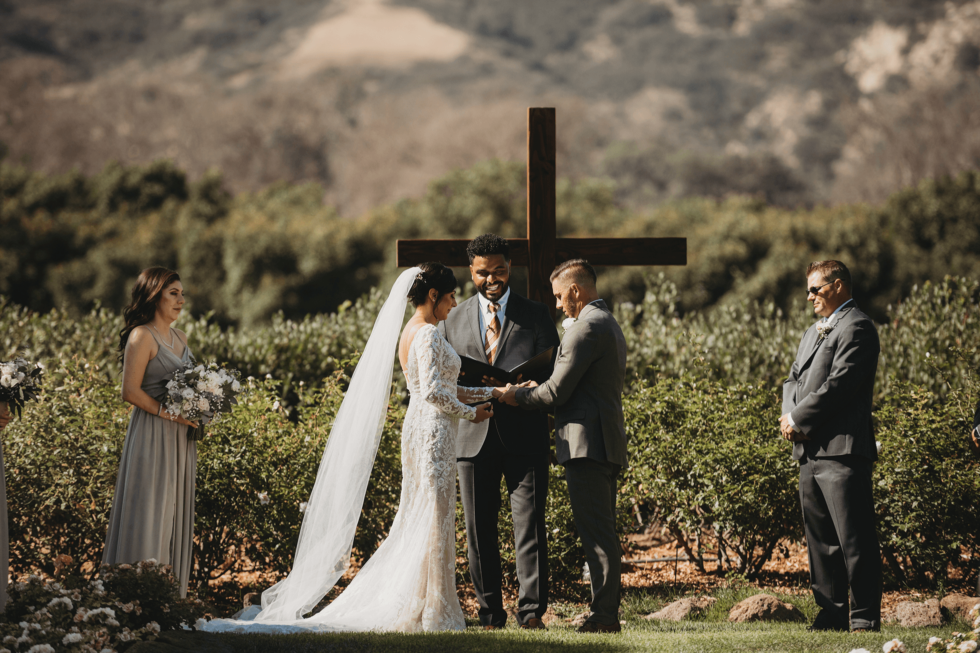 Close-up wedding ring exchange photo during ceremony