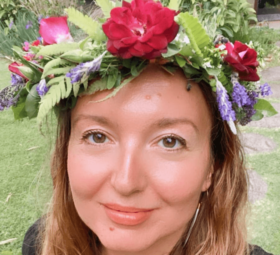 Woman wearing flower crowns.