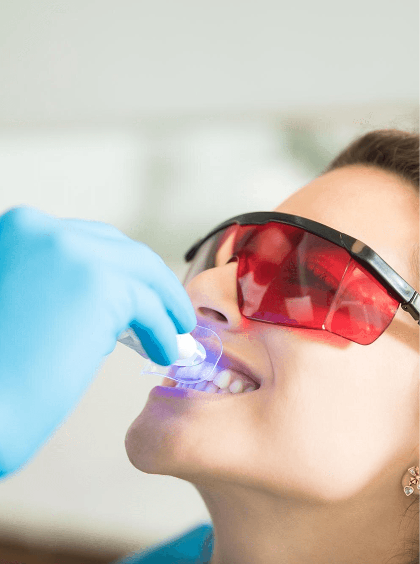 Patient undergoing dental laser treatment