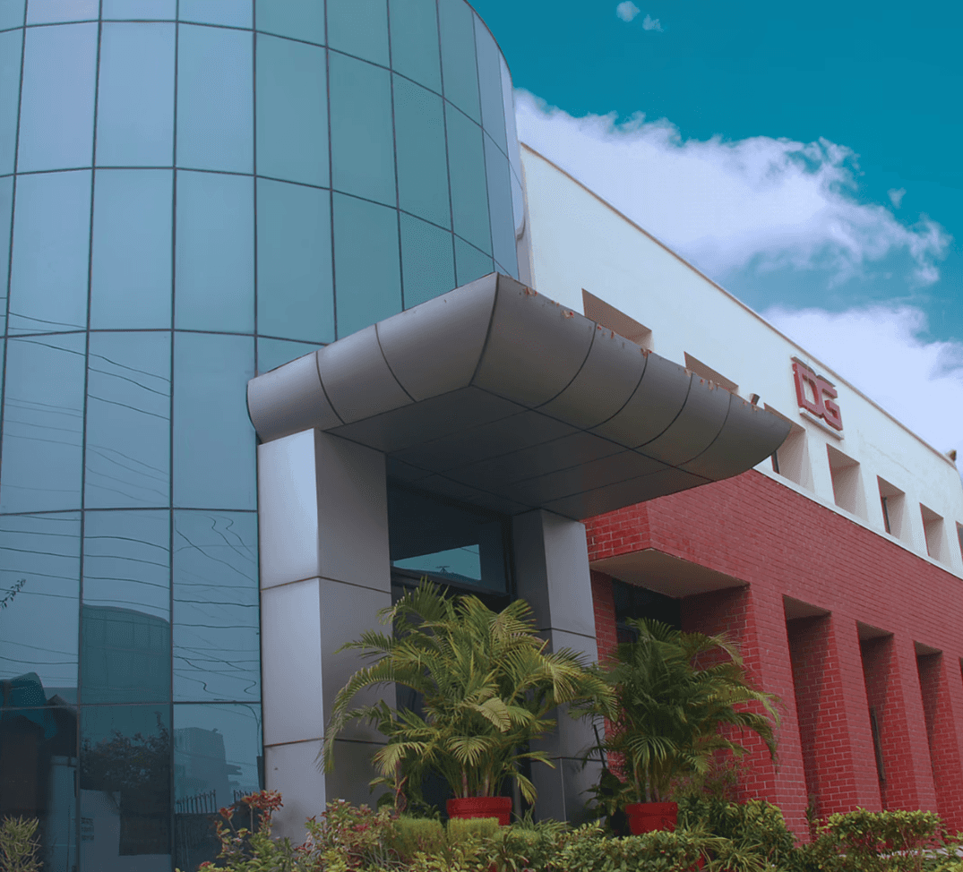 woman holding a phone and man looking at the phone. both are smiling