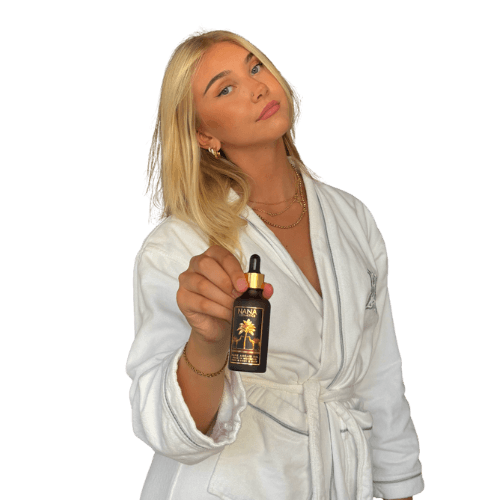 Beautful woman smiling and holding her cheeks