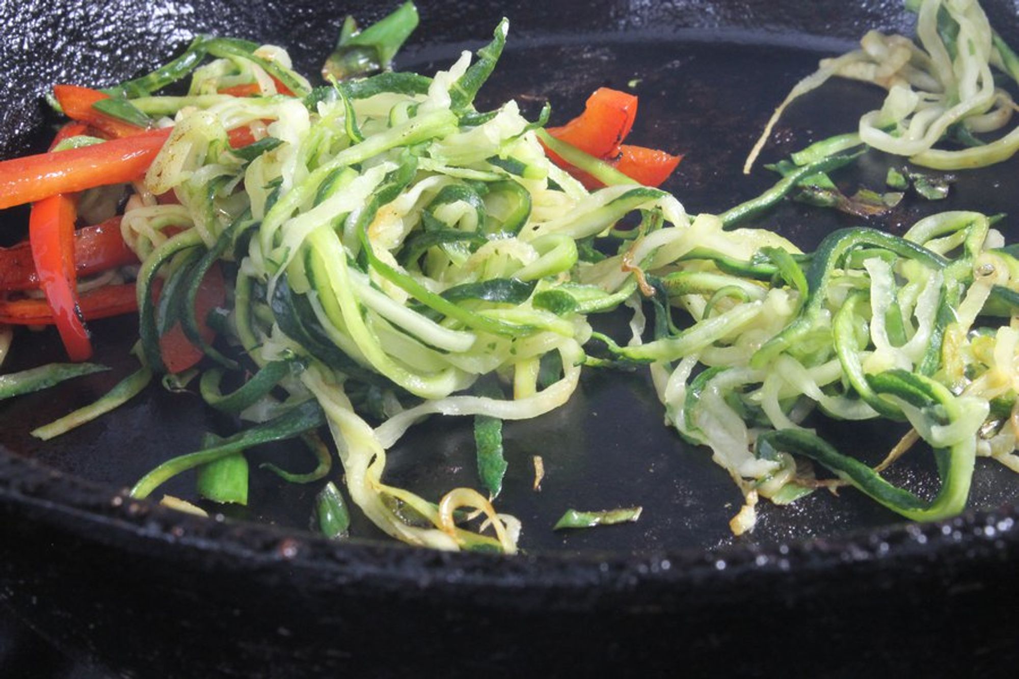 noodles ang pork in a pan