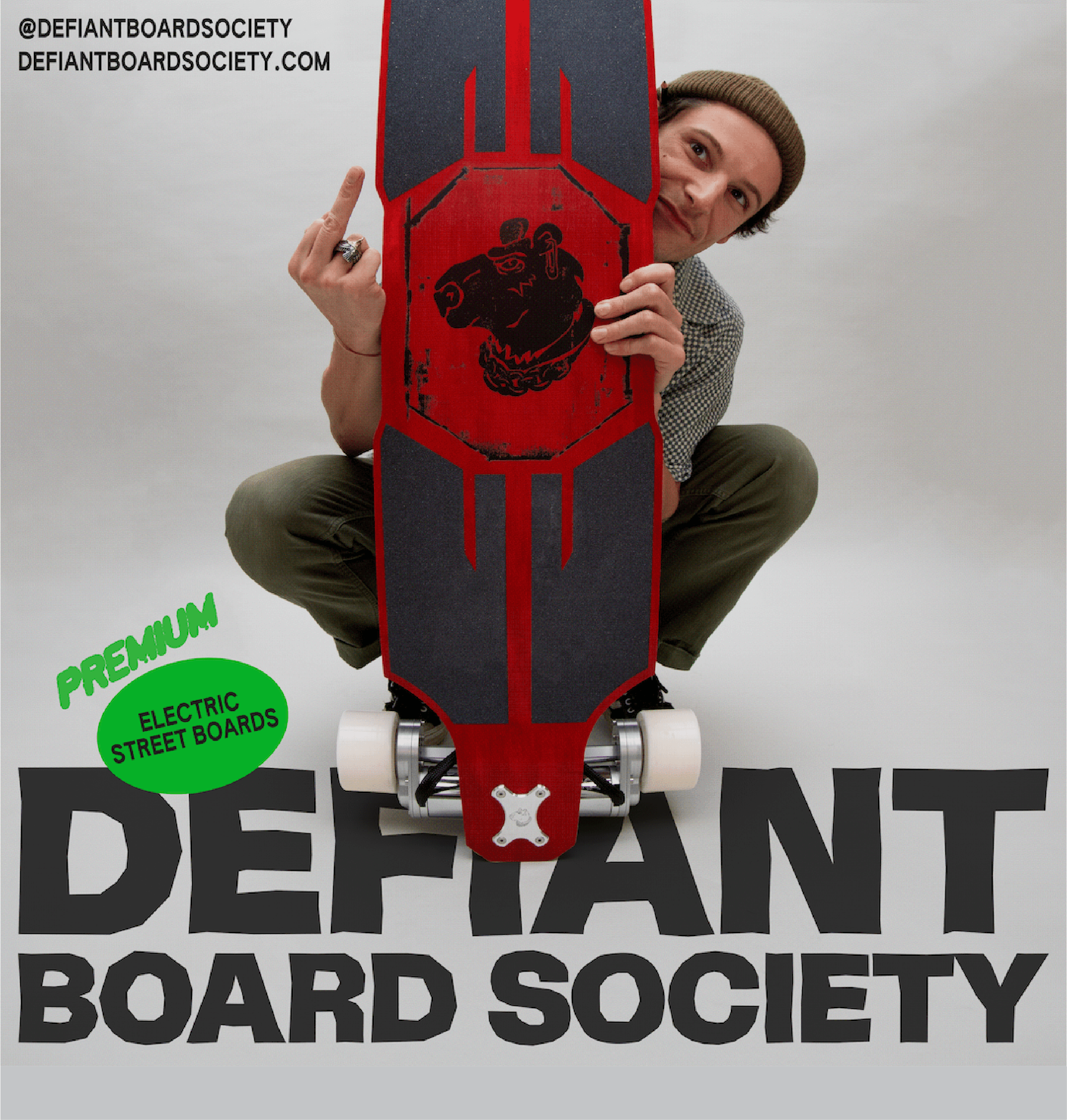 Person crouching behind electric skateboard with bold Defiant Board Society typography