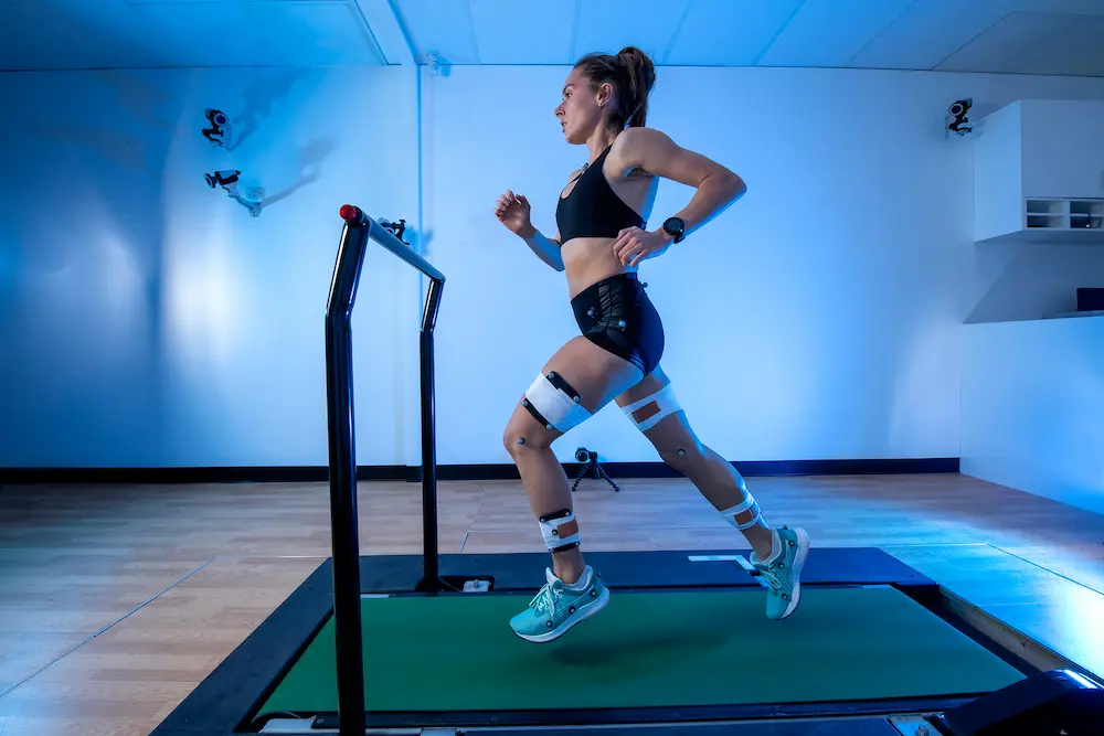 a wman getting tested in a 3d gait analysis lab