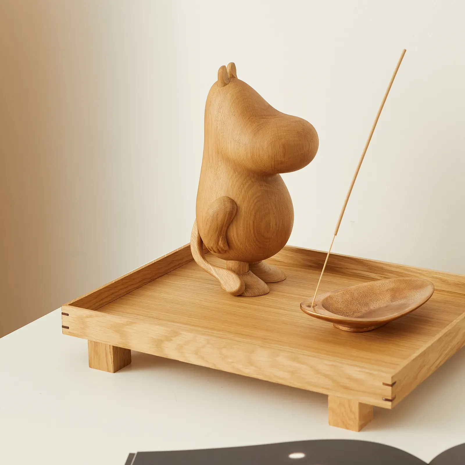 Boyhood Moomin wooden figurine developed as a licensed collectible object with simplified 3D character proportions