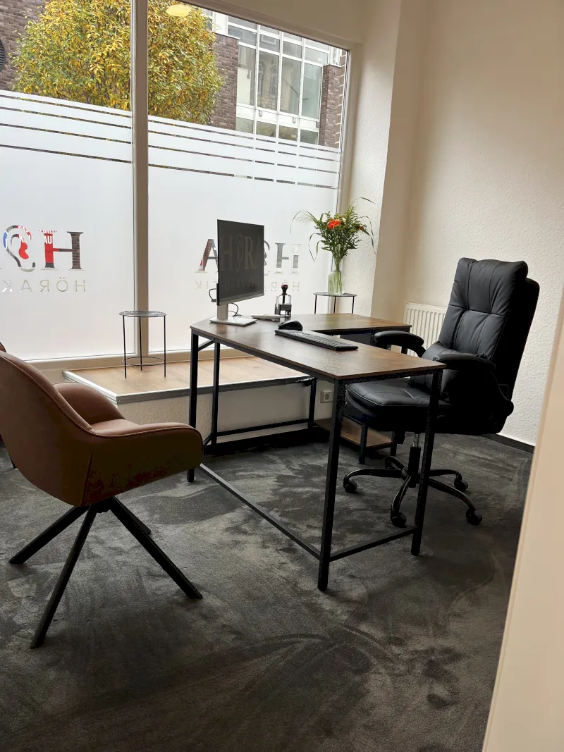 black flat screen tv on brown wooden table