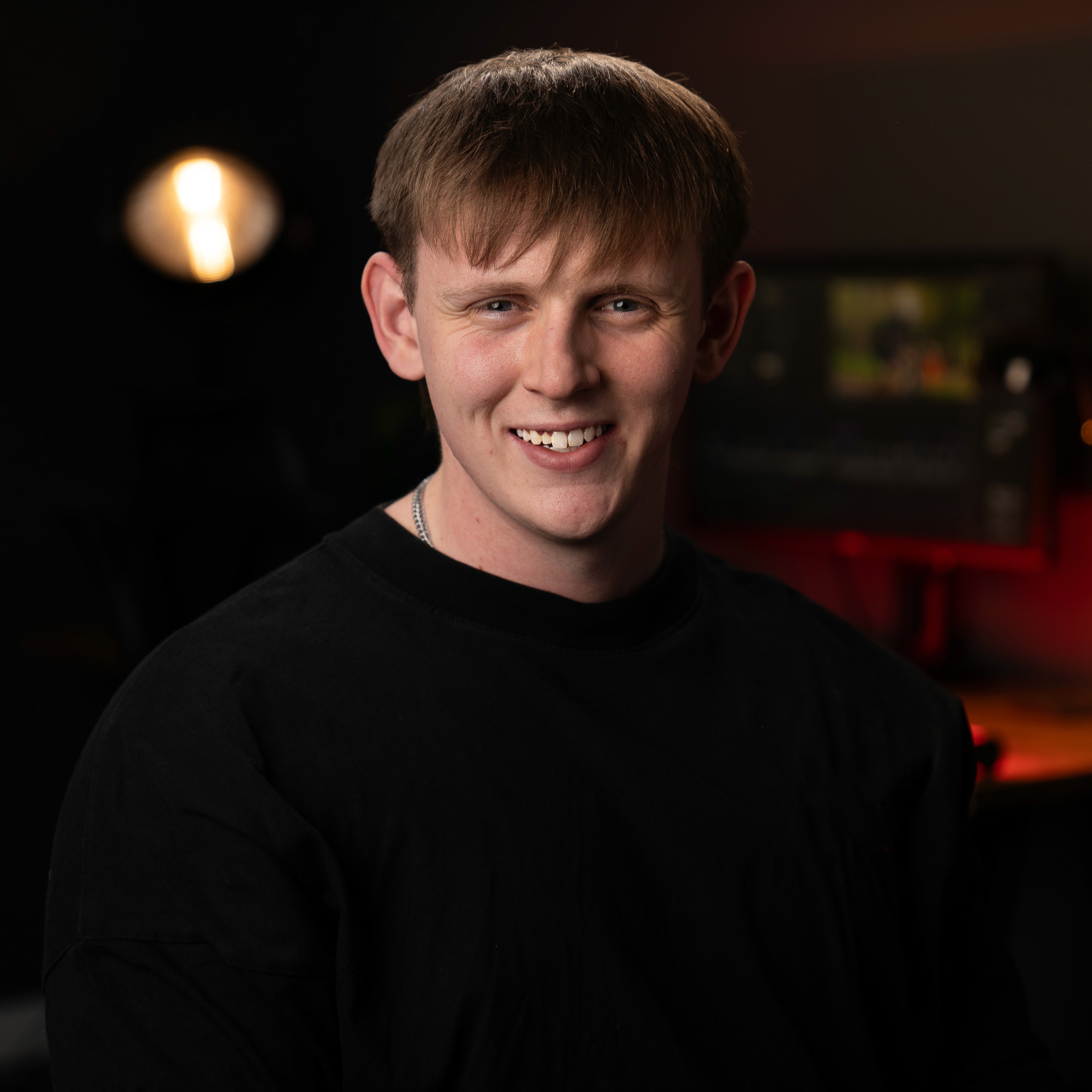 Young woman smiling at someone