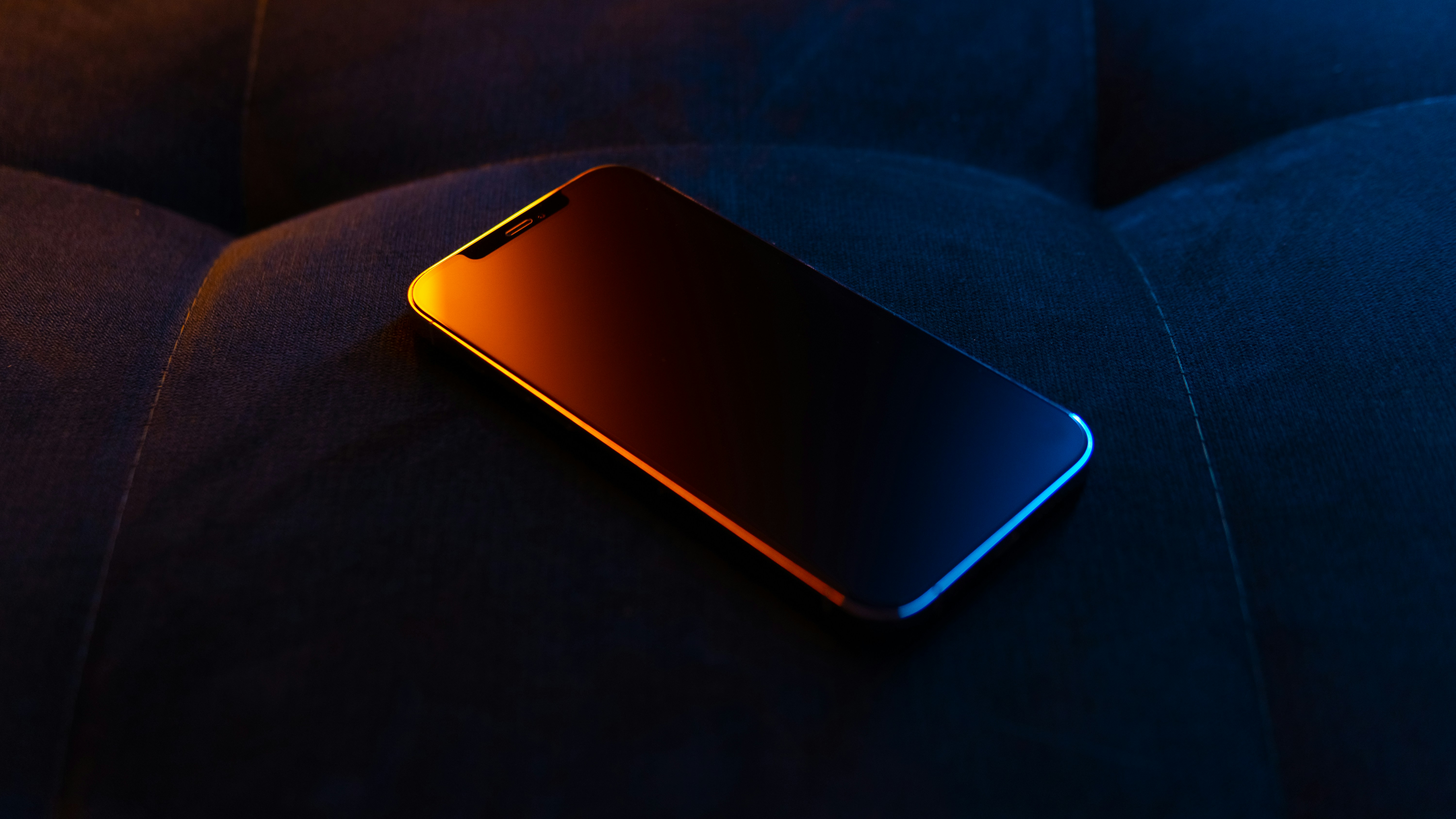 a cell phone on a couch