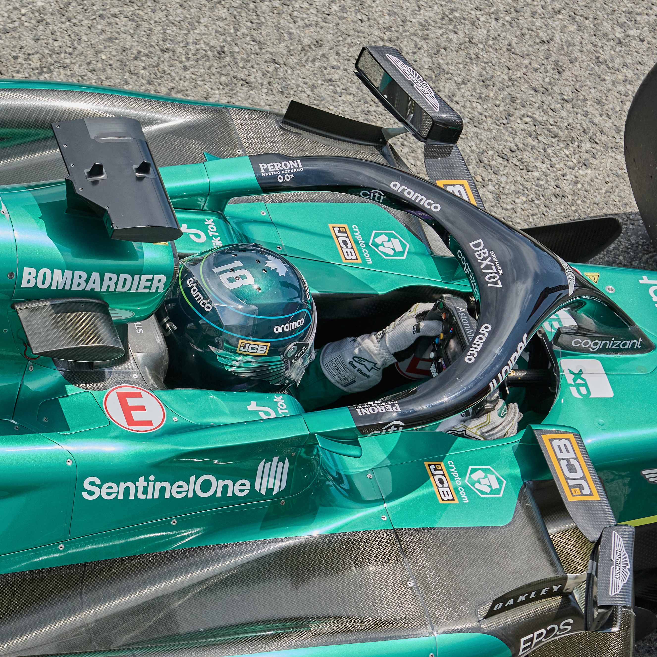 a woman sitting on a chair with a hair dryer