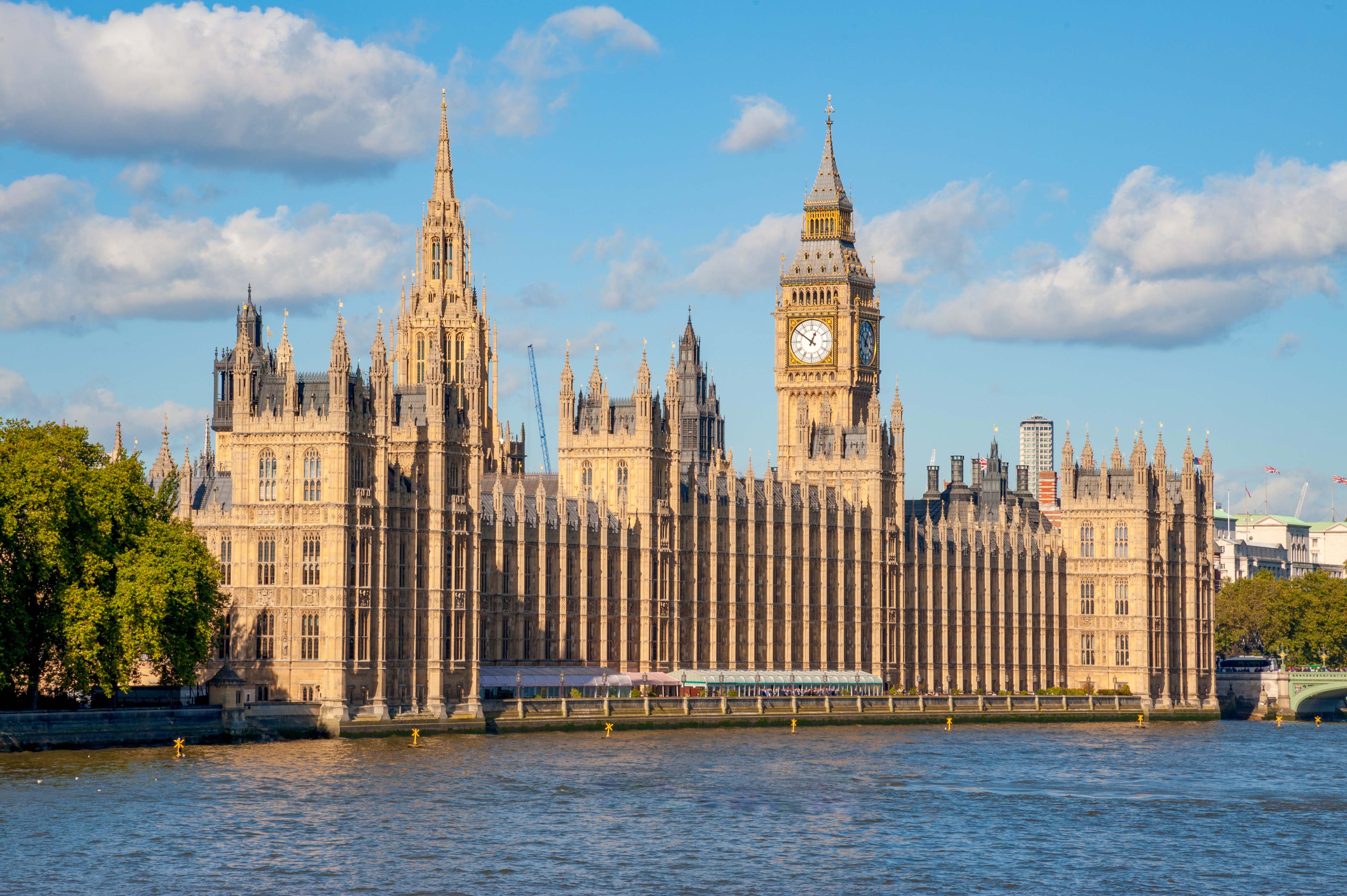 Houses of Parliament and Big Ben by the River Thames in London.