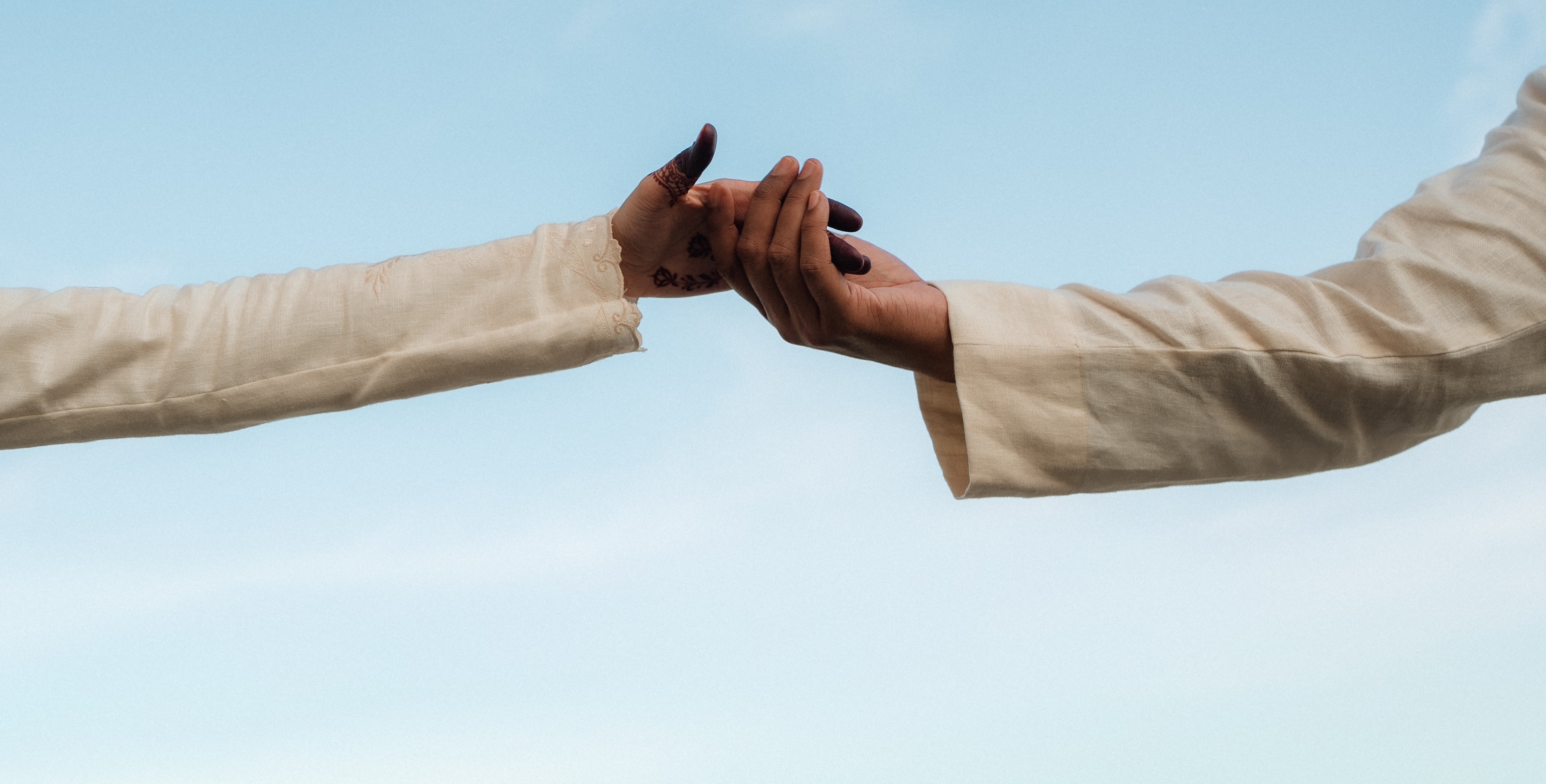 Groom holding the hand of a bride in Singapore.