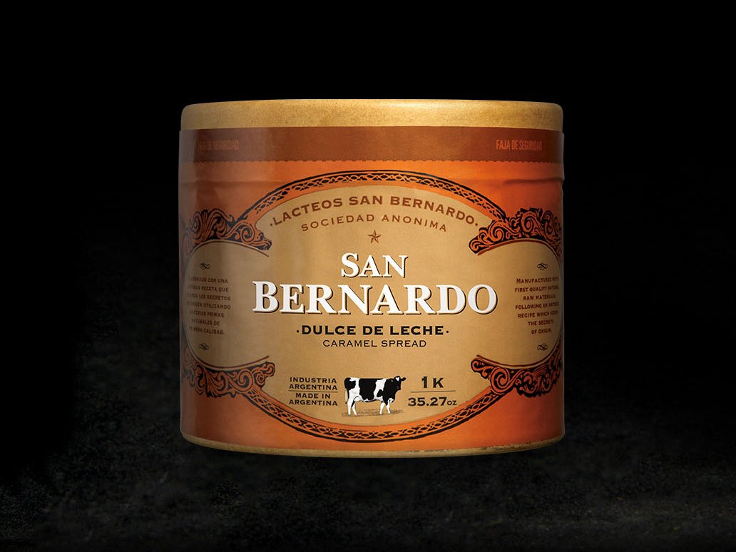 Rustic cabin in a golden field at sunset