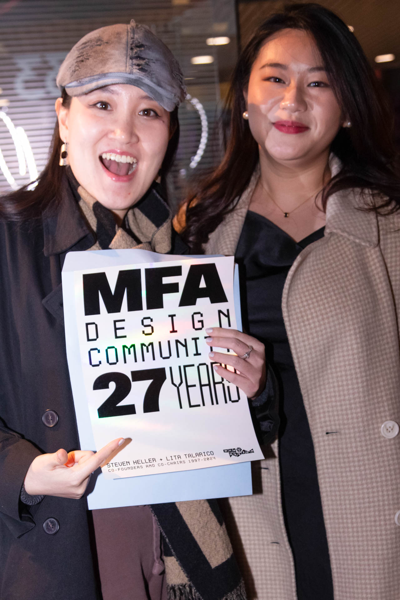 a group of students smiling for the camera in the SVA Theatre lobby after the Venture Forum