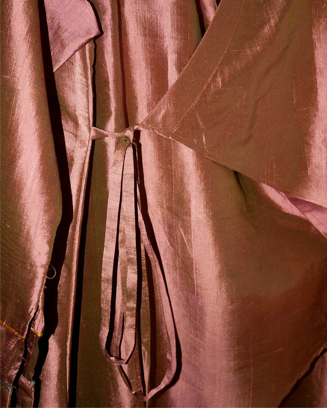 Vastram asymmetrical tunic with patch sleeves paired with Pancha drape skirt featuring bordered hem.