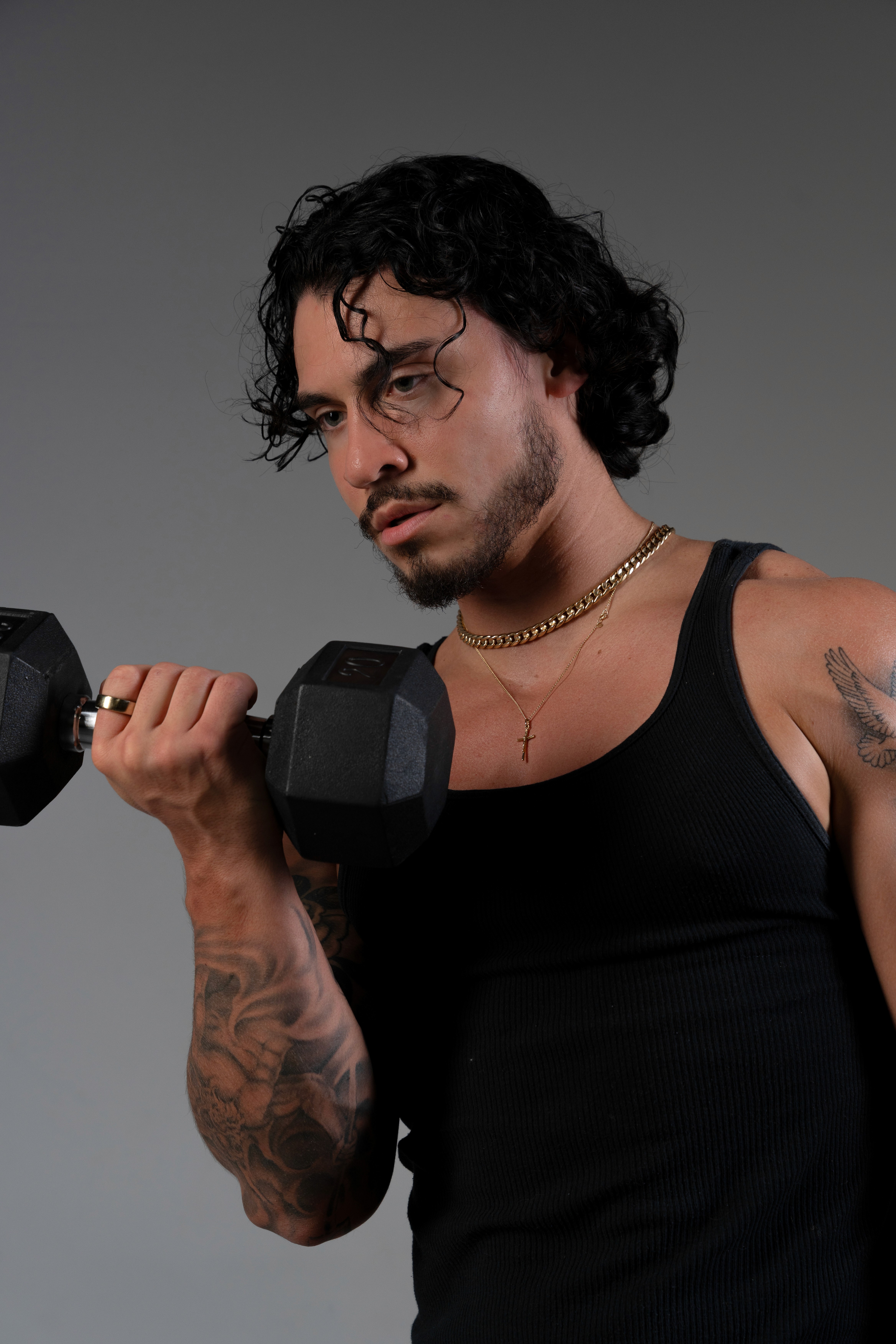 A smiley boy holds a table