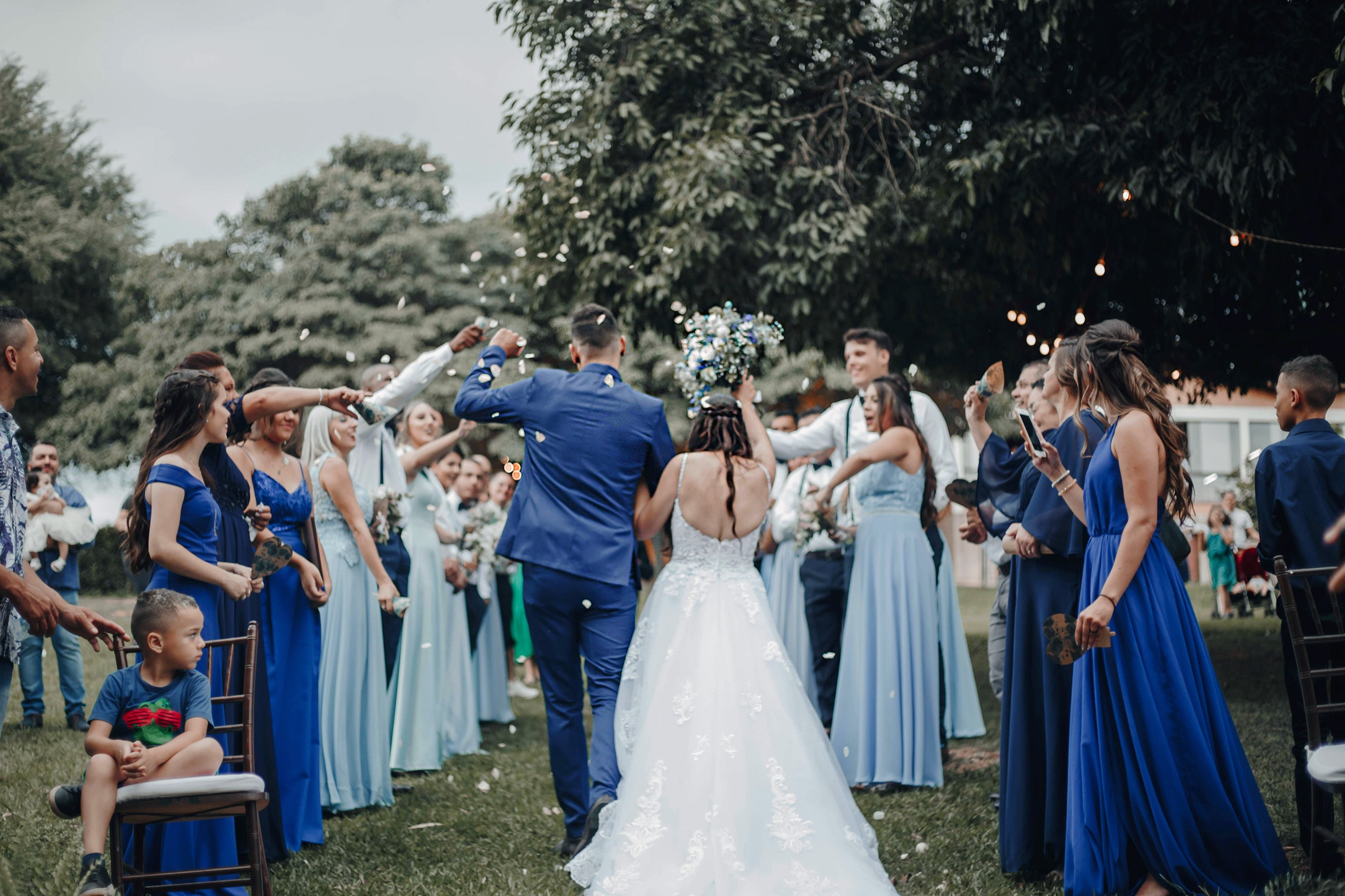 A bride in a white gown and a groom.