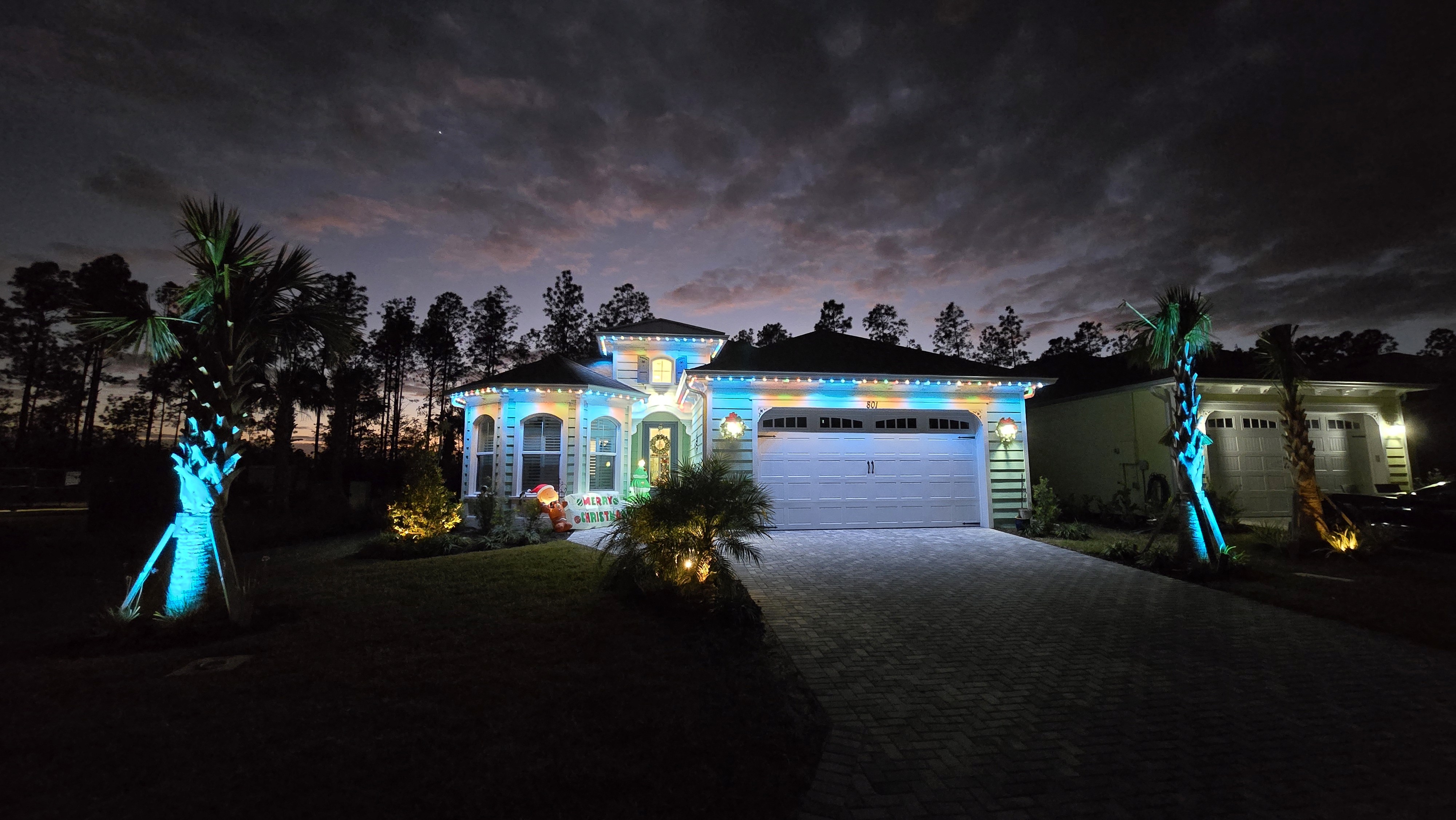 Permanent Gemstone LED lighting installed along roofline of residential home