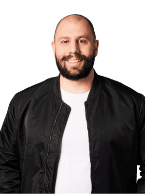man in suit jacket sitting down