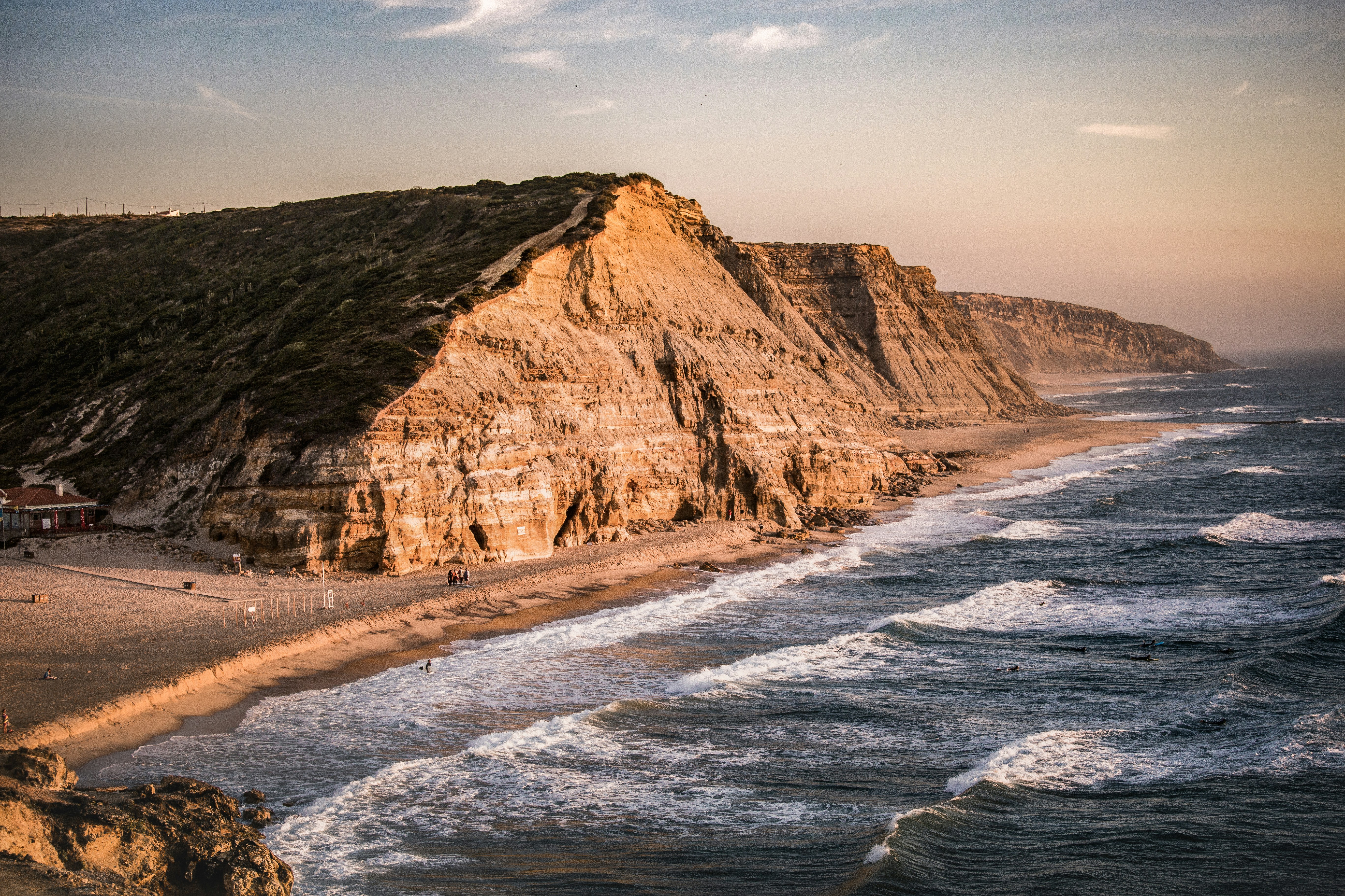 Aerial view of cliffs at beach near Ericeira Wild Souls housing for digital nomads Portugal