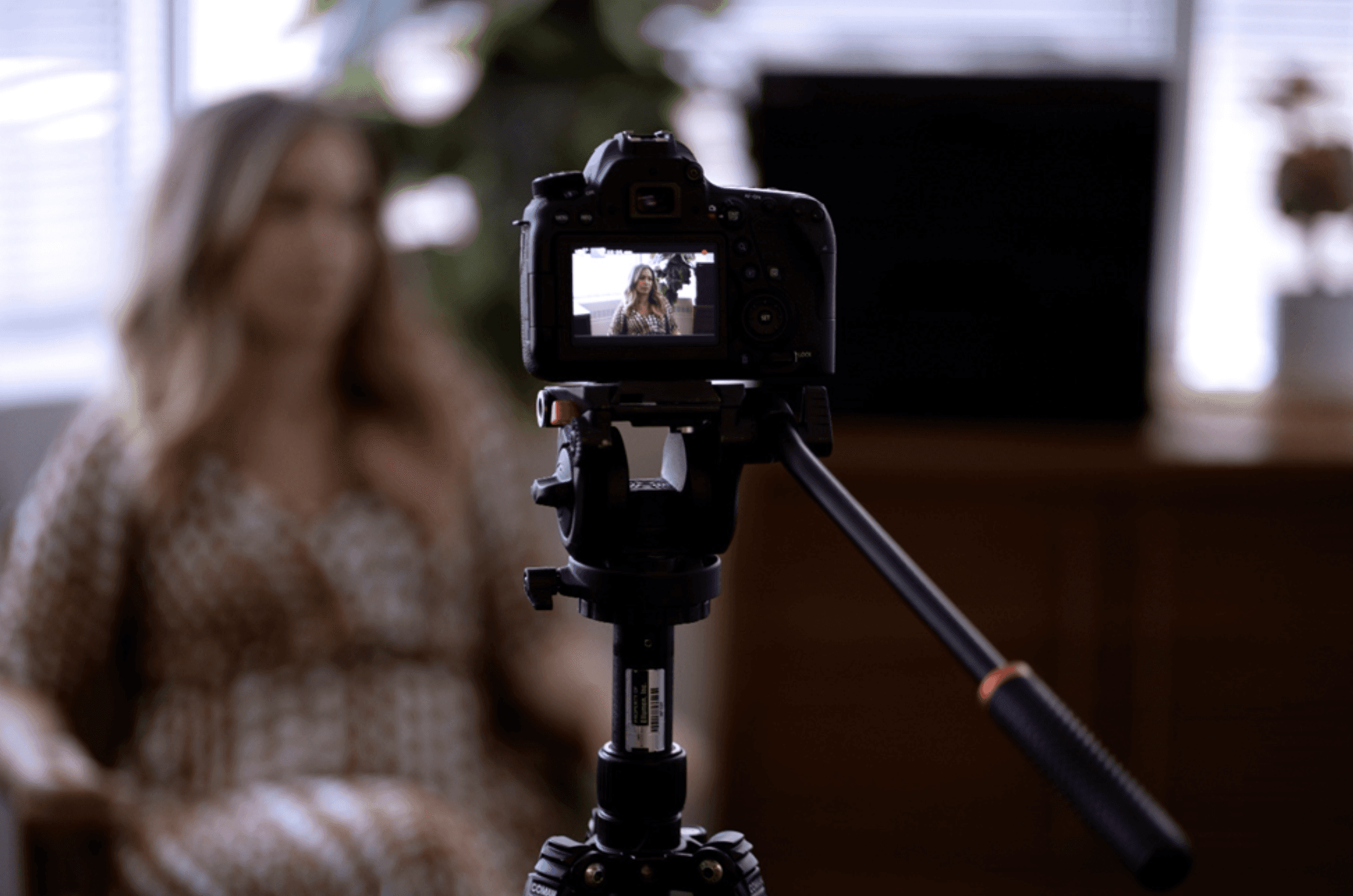 Close-up of a professional camera recording in a studio environment—representing video production or digital storytelling.