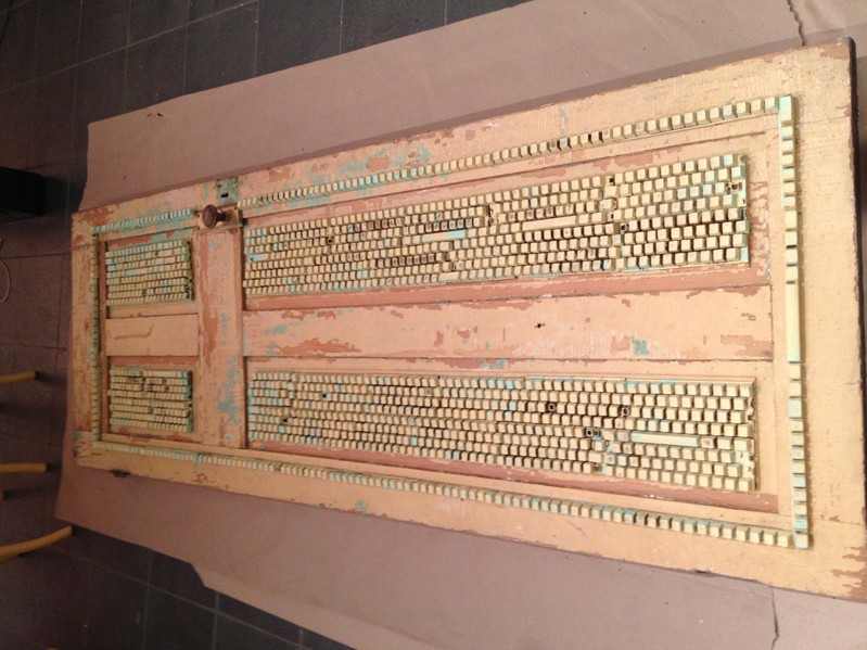 installation view of a sculpture made with keyboard keys