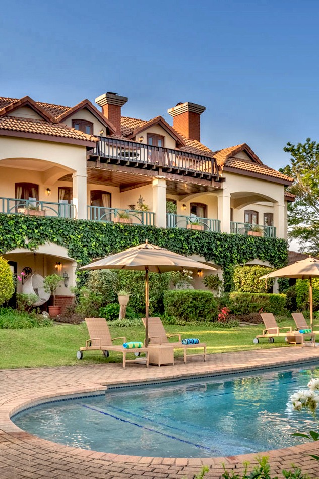 The best pool in Mpumalanga, with a view of the luxury rooms at Olivers, White River, South Africa