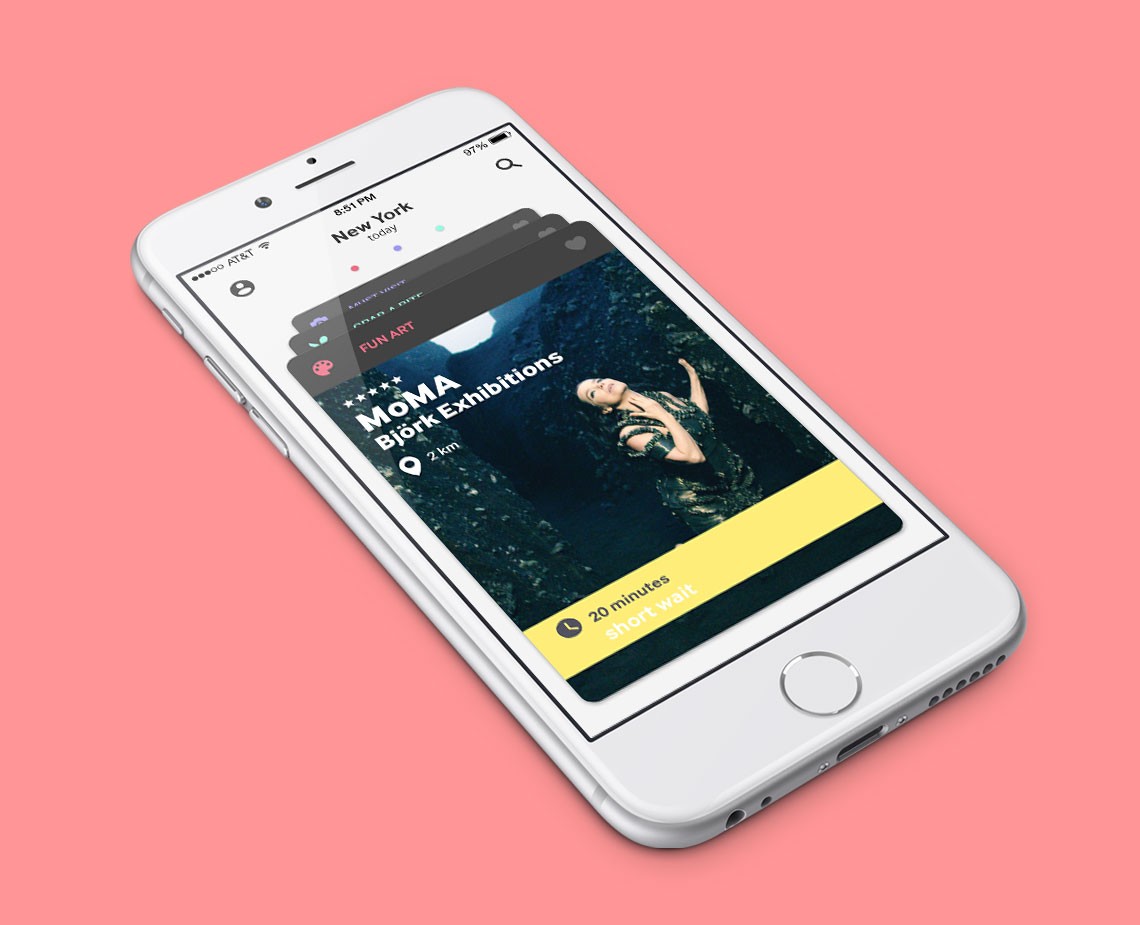 A white iPhone lies on a pink background, displaying the app “MOMA Björk Exhibitions” on its screen. The app interface shows various categories including “FUN ART,” “FANTASY ART,” and “FANTASY ART & MORE.” A yellow banner at the bottom reads “20 minutes short wait.” The top of the screen displays “New York” and “Today.” The phone’s status bar shows “8:51 PM,” “97%,” and “AT&T.”