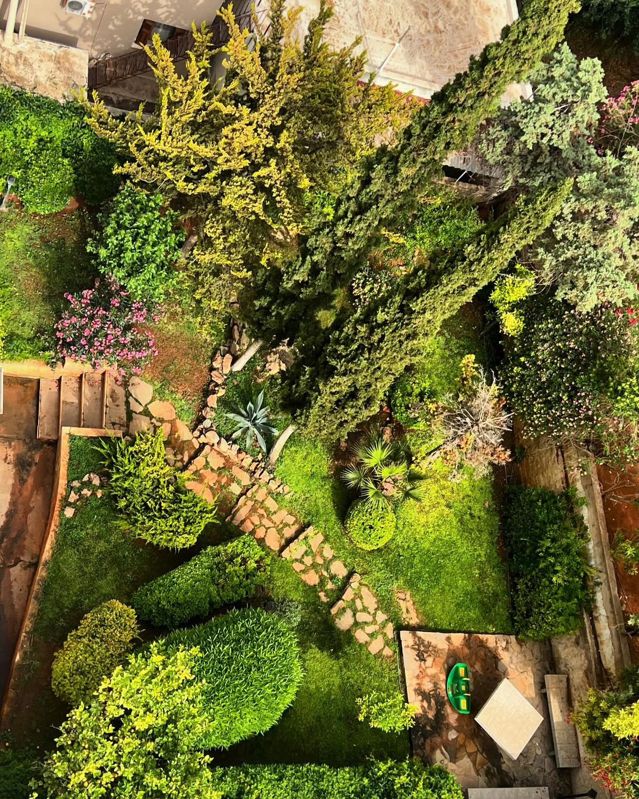 Beautiful landscaped garden with greenery and outdoor design elements.