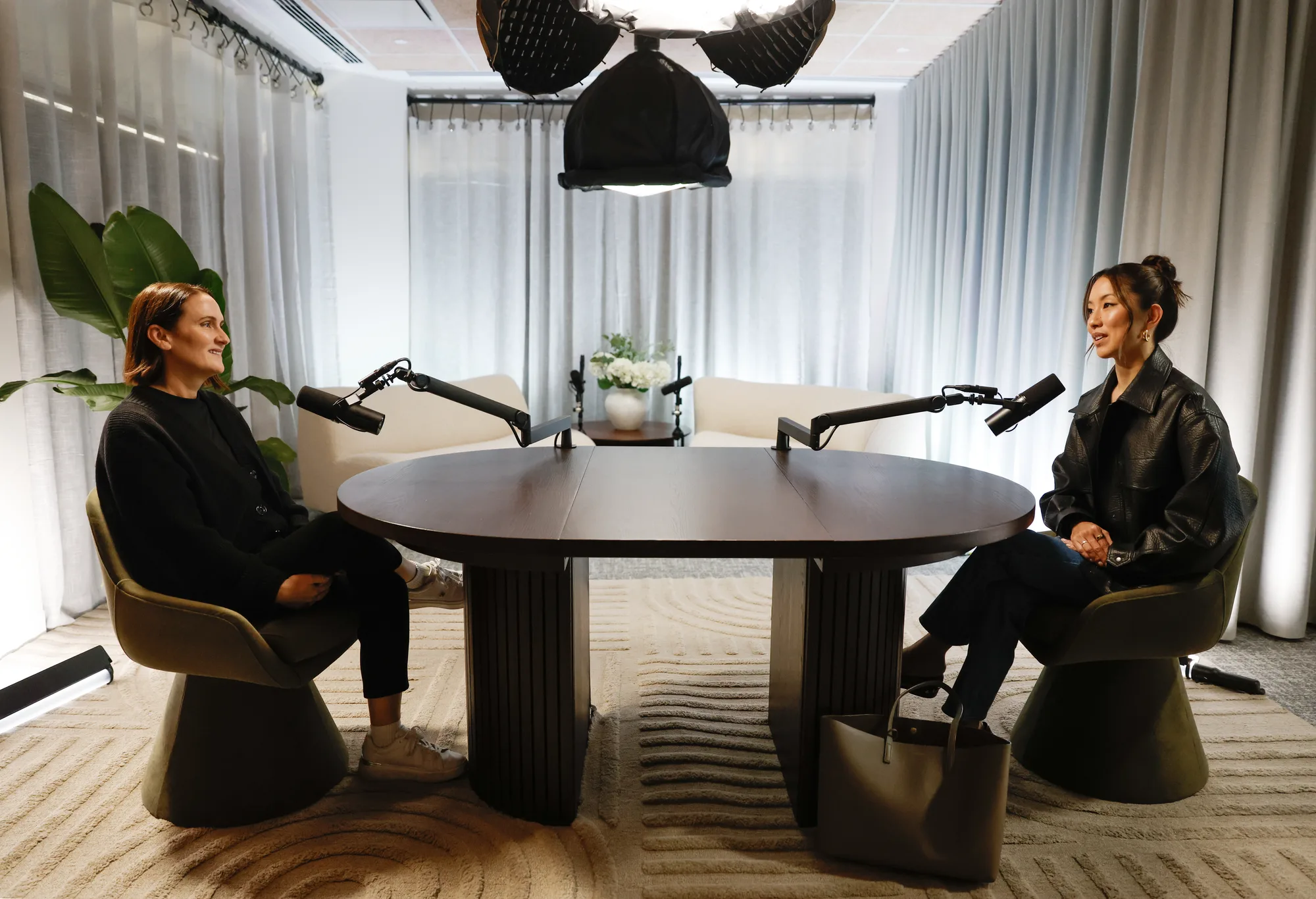 The OAK set during a recording setup with two people having a conversation.