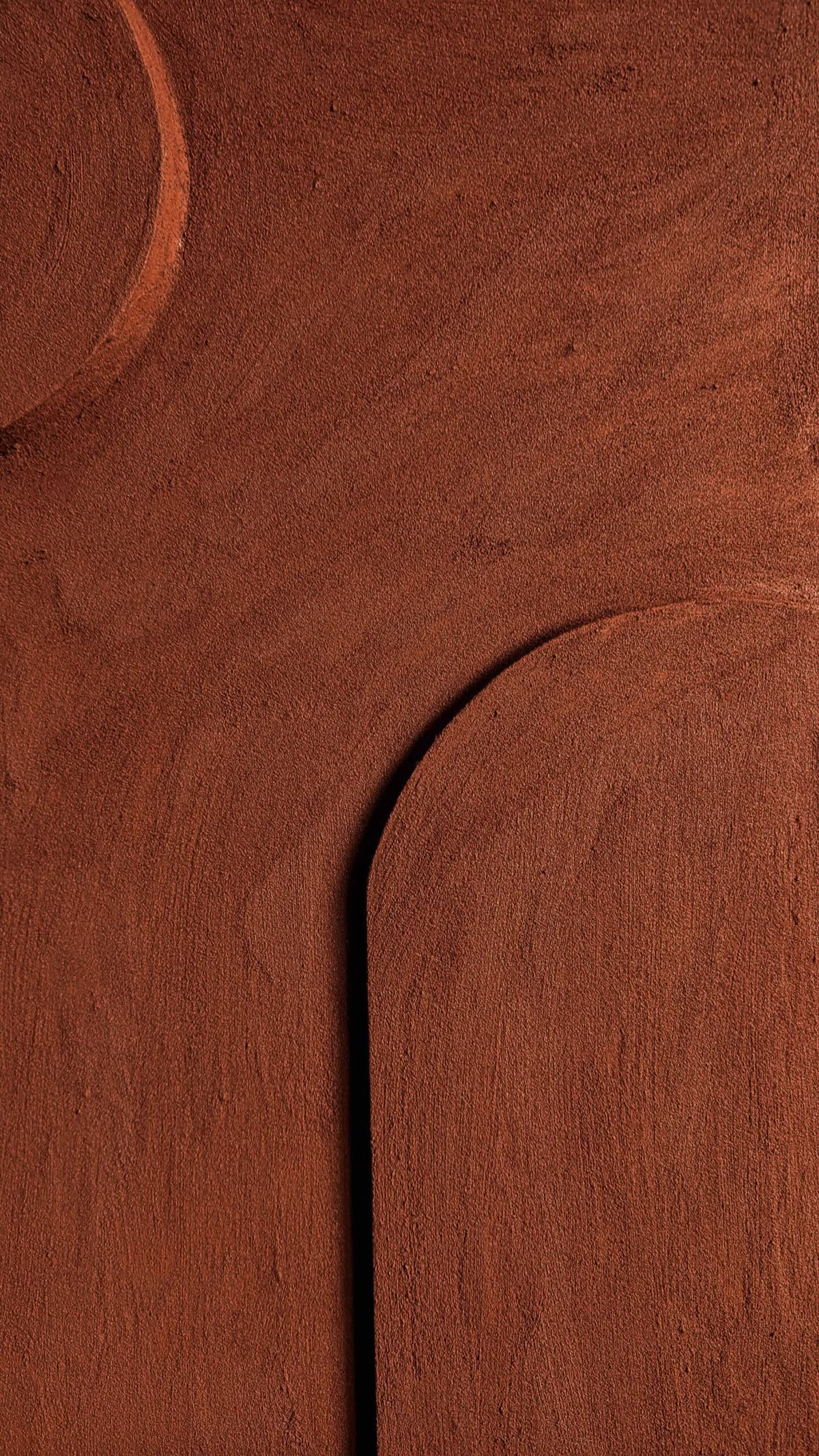 person writing on a piece of paper 