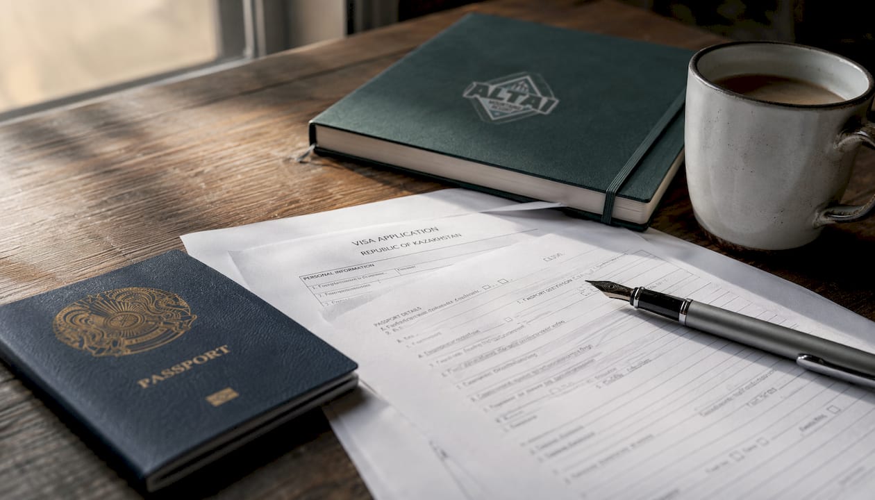 Visa application documents arranged on an office desk