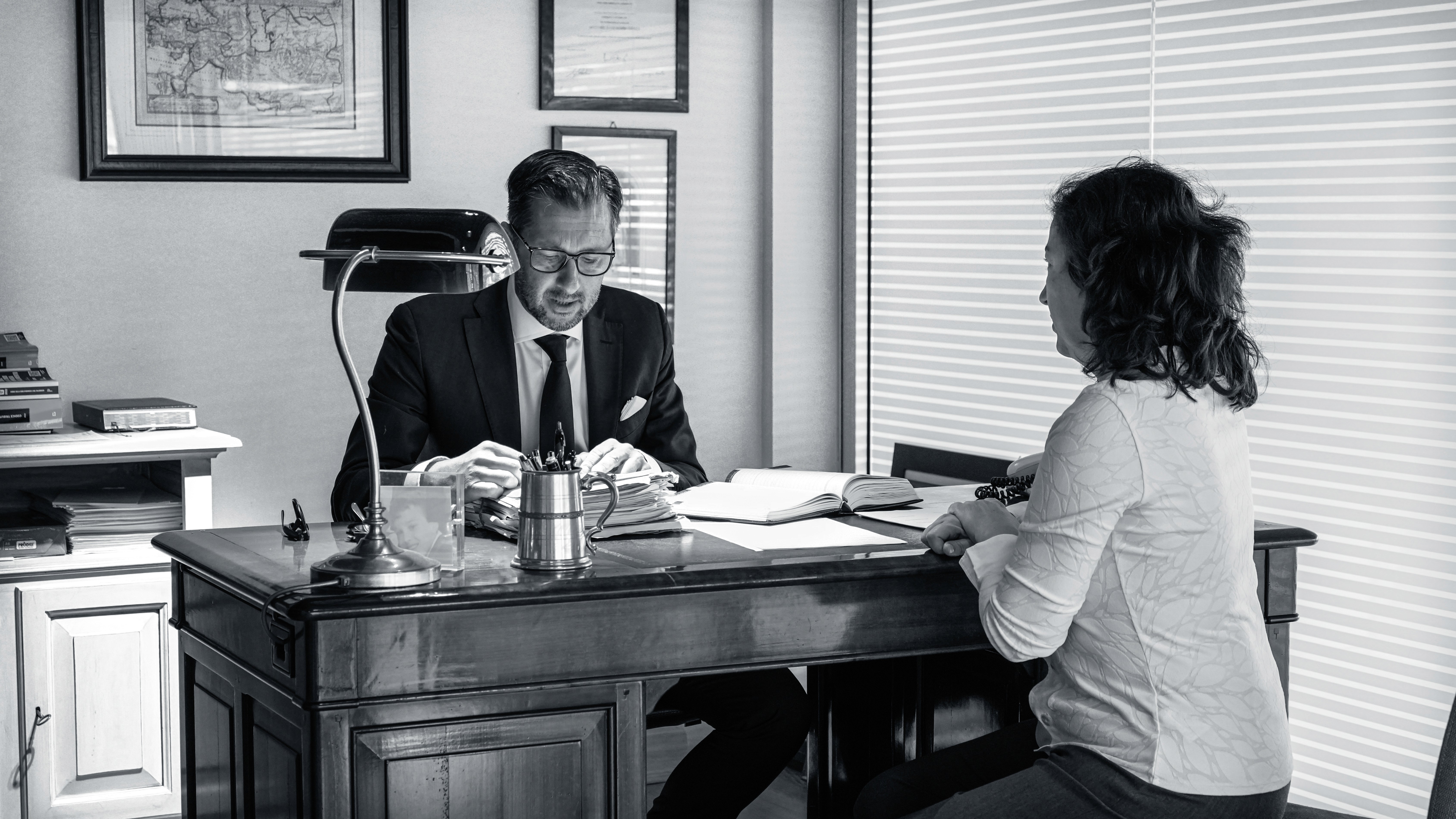 book lot on black wooden shelf