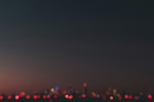 a blurry photo of a city at night