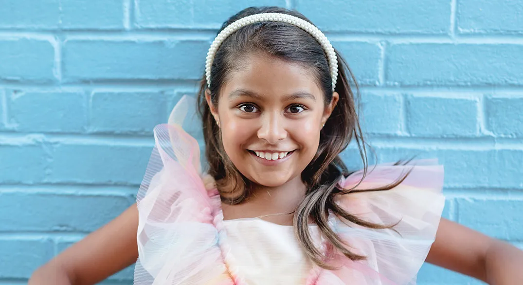 Smiling kid for Dr. Shwetha Rai, Pediatric Dentist in Arlington. Your Kids Tooth Doctor!