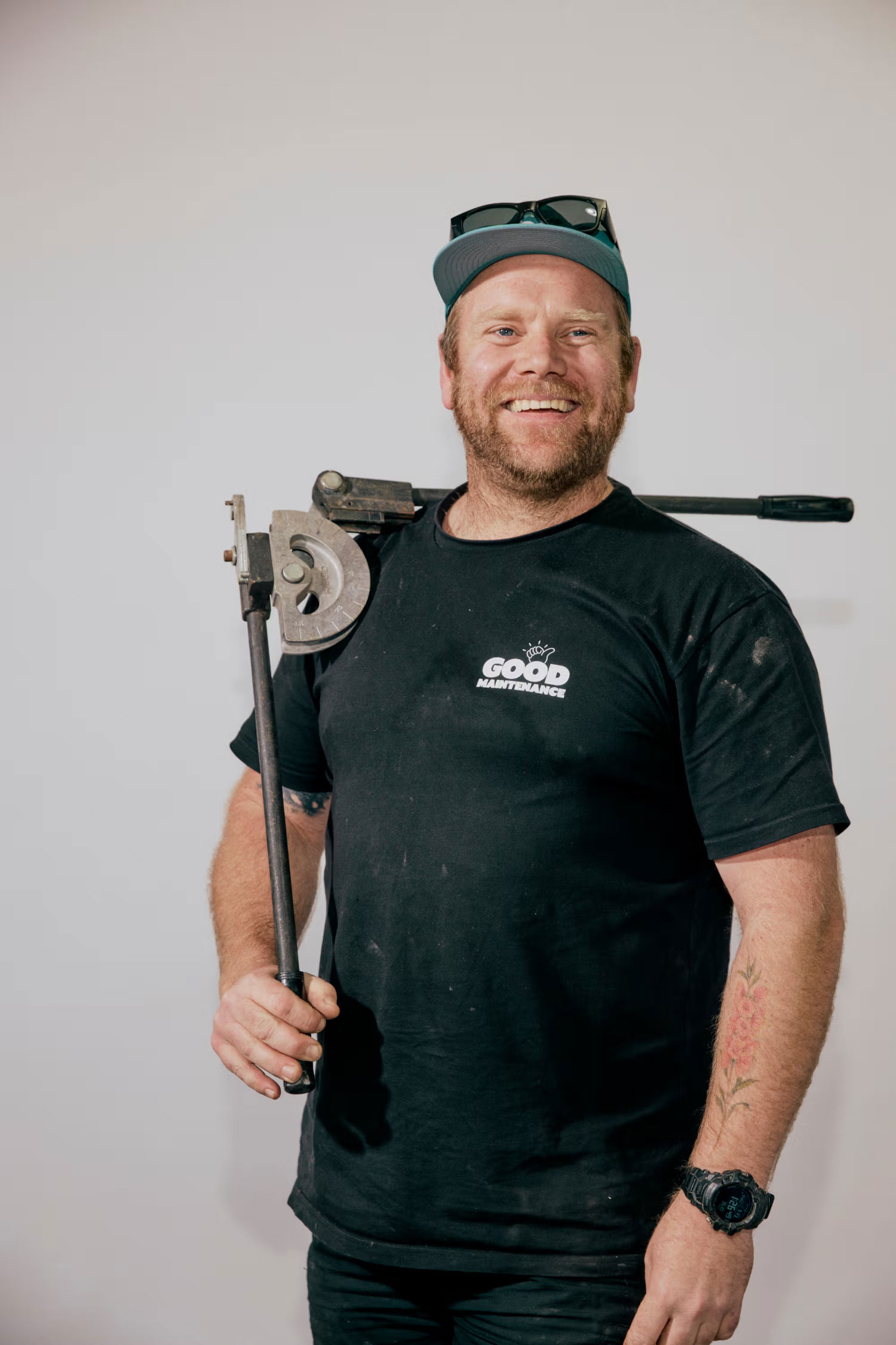 Good Maintenance Team Member posing with a tool