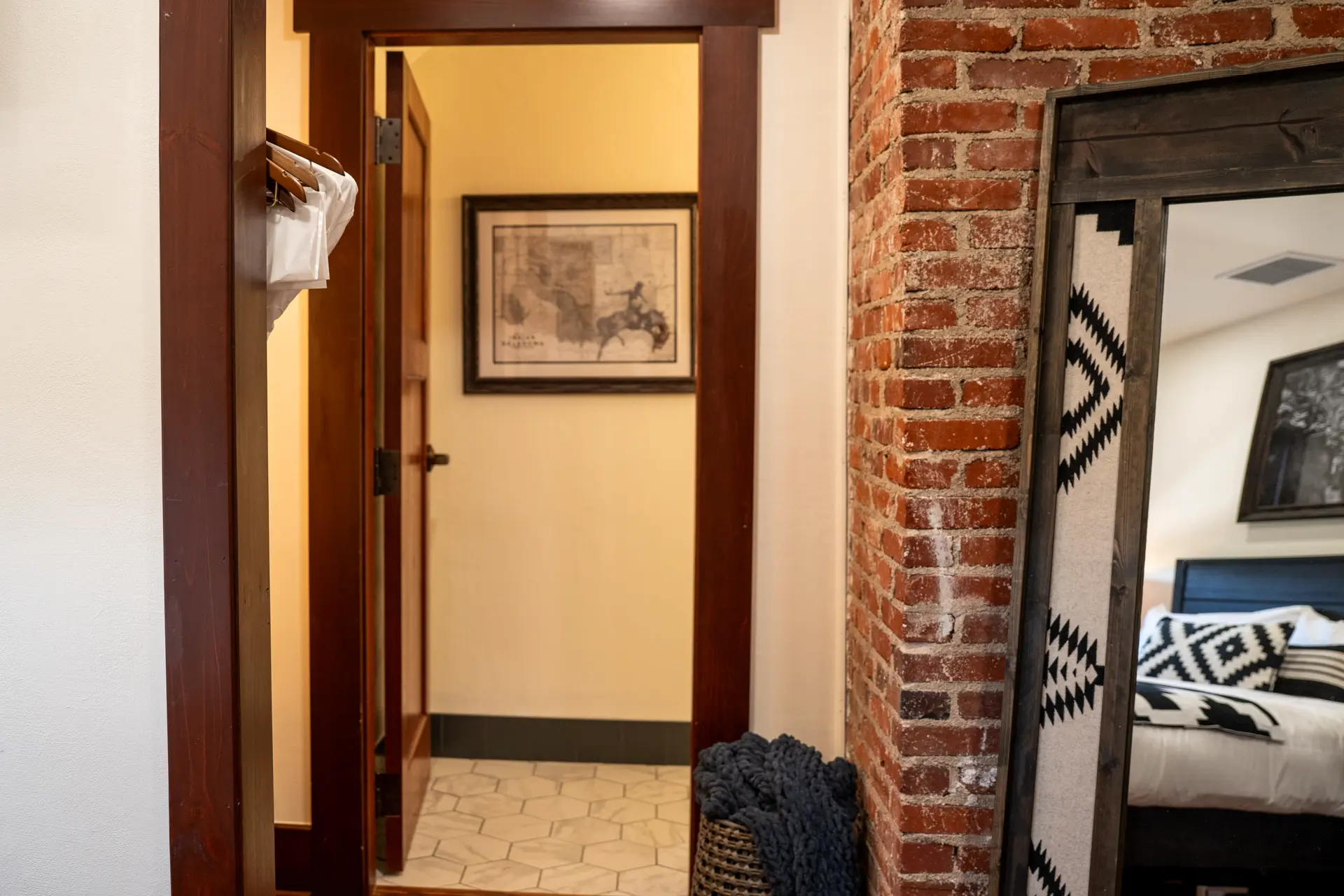 Bathroom entrance with hexagon tile floor