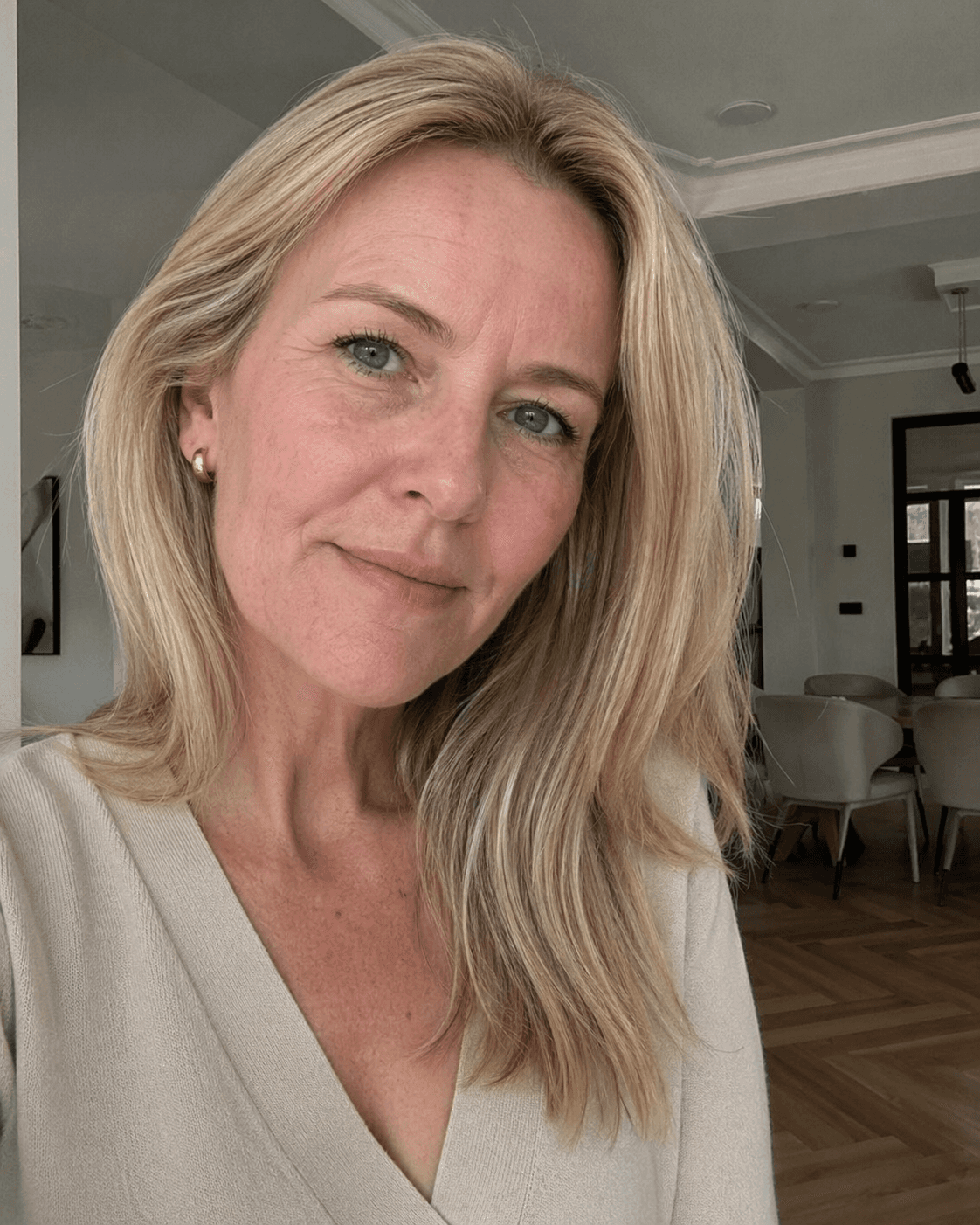 a woman standing in front of a building