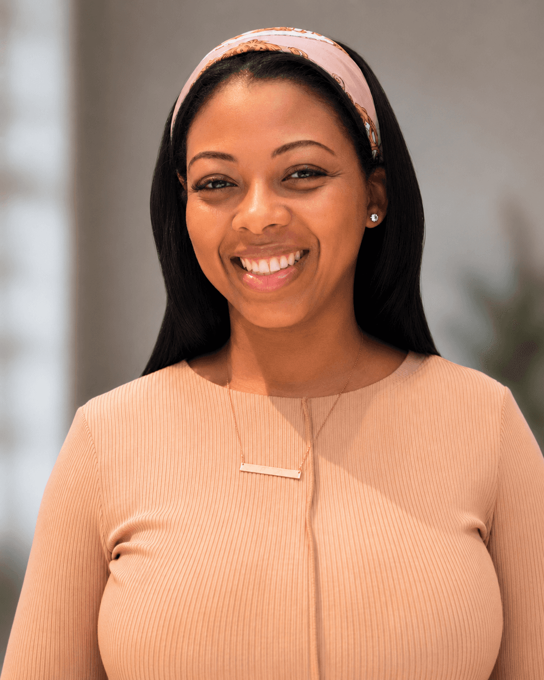 woman in white crew neck shirt smiling