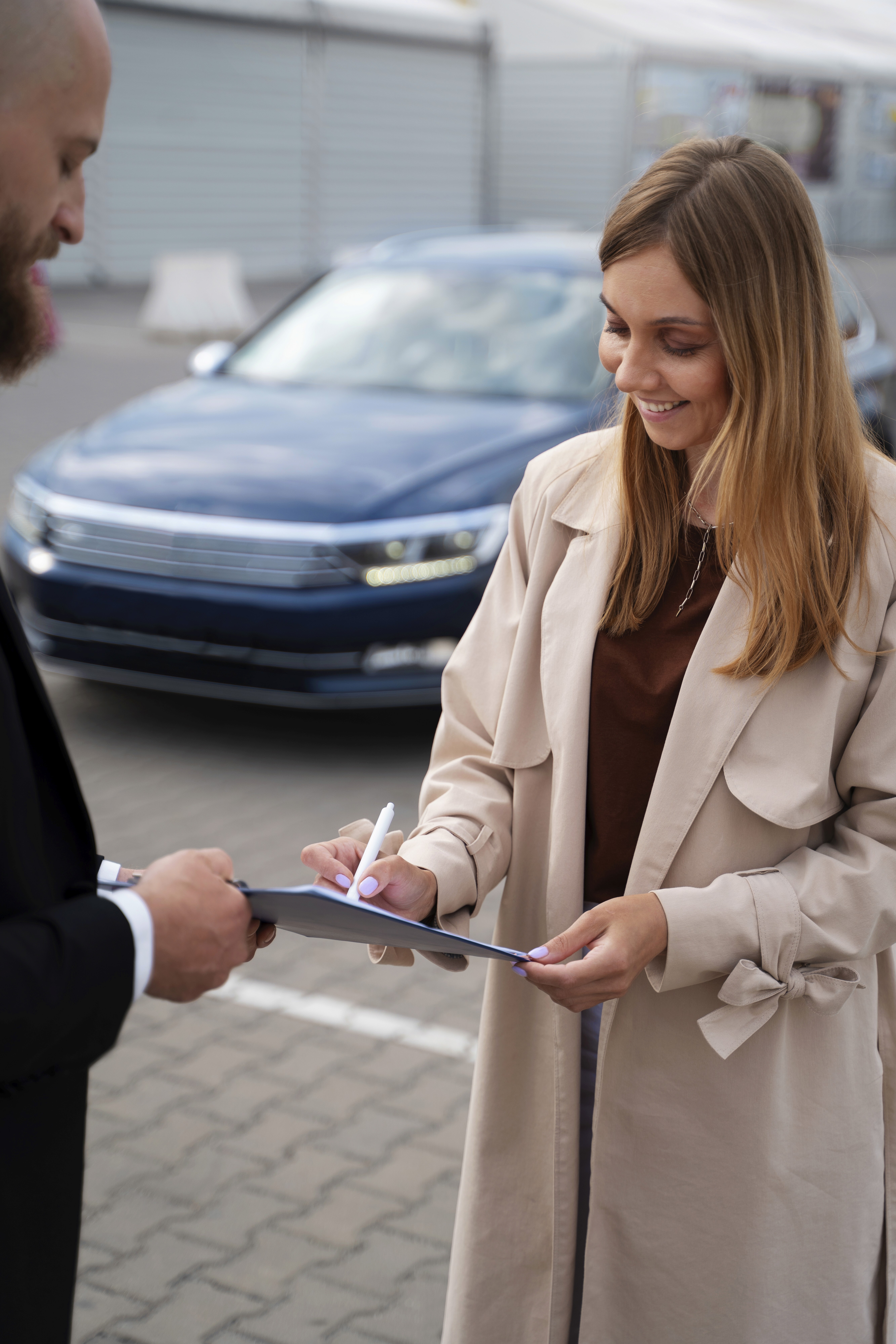 Collection of luxury sports cars displayed in modern rental showroom