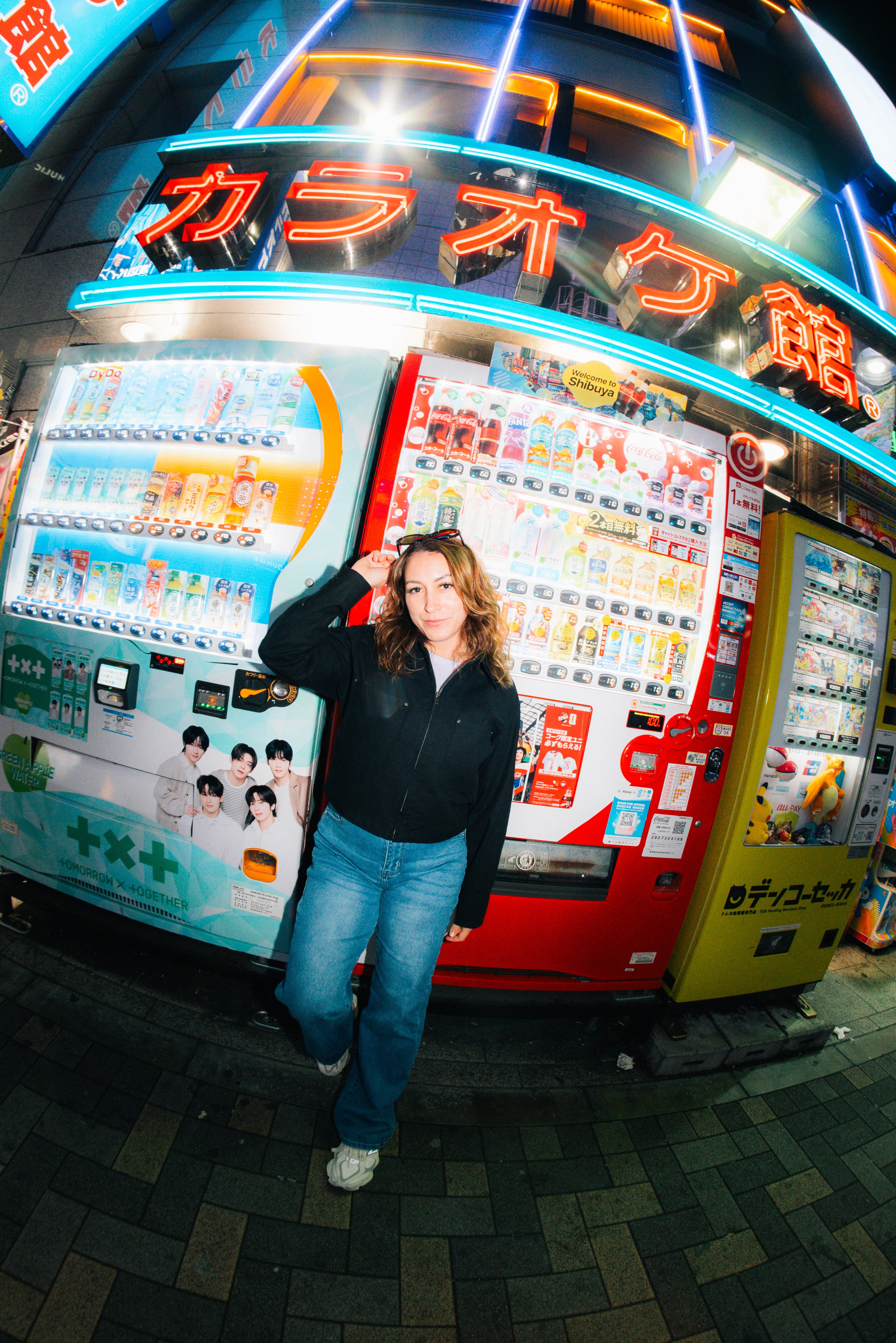 Bryna in Shibuya at a vending machine