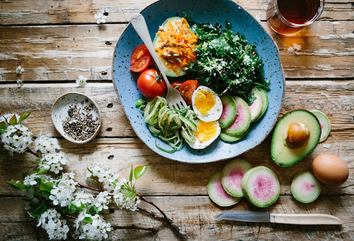 woman eating a healthy meal to complement her weight loss medicine prescription