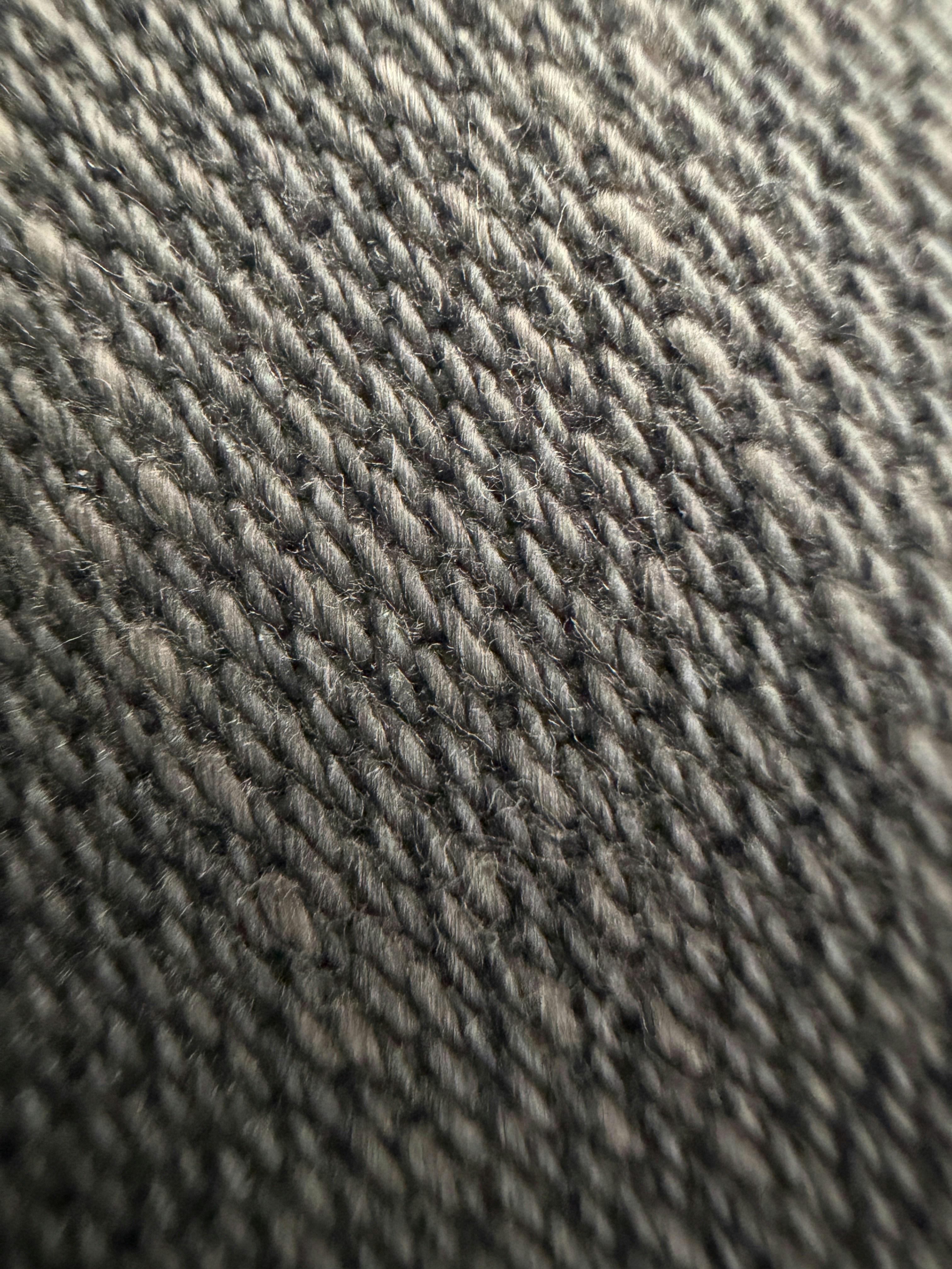 a close up view of a gray fabric