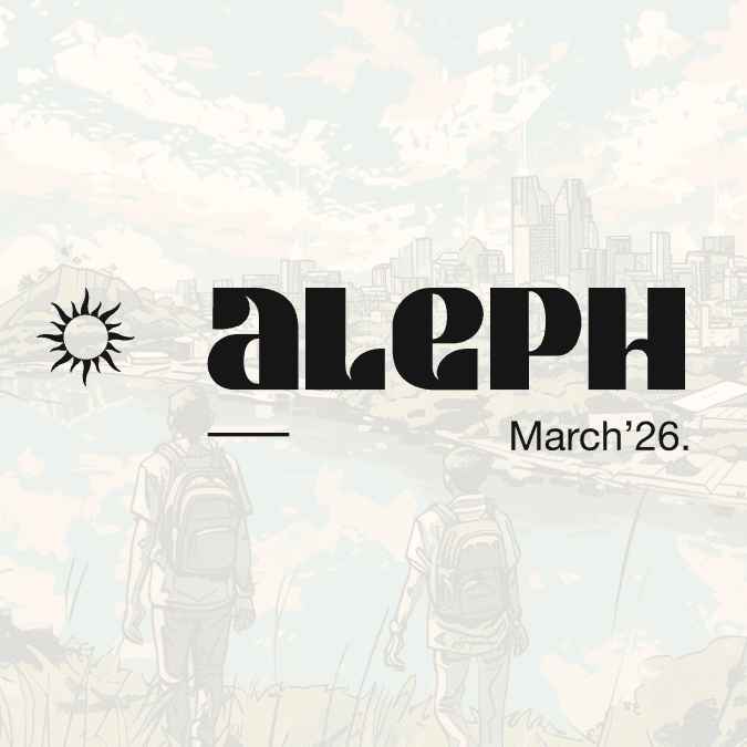 gold and black bottle on white wooden table