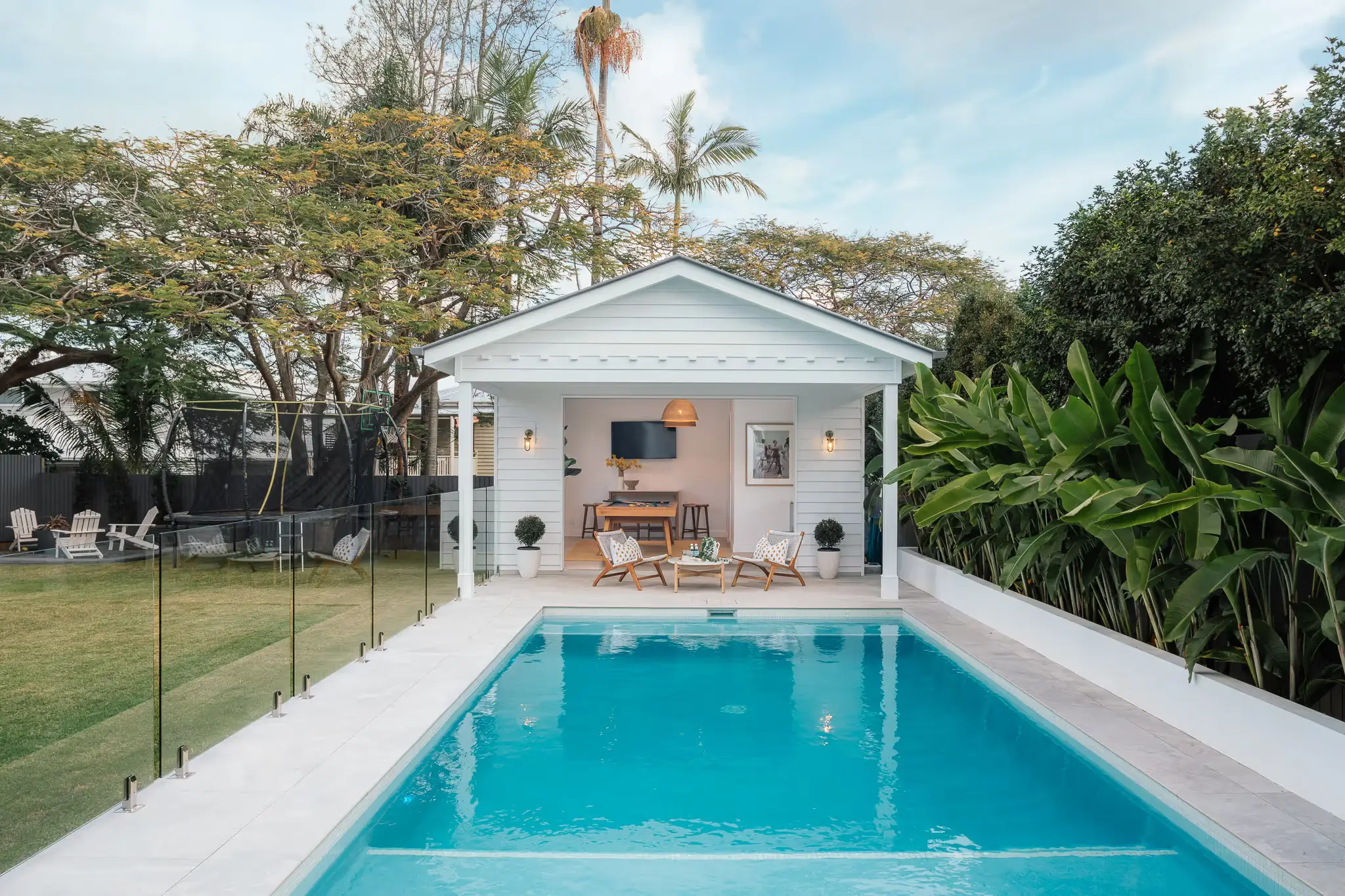A pool with its own pool house