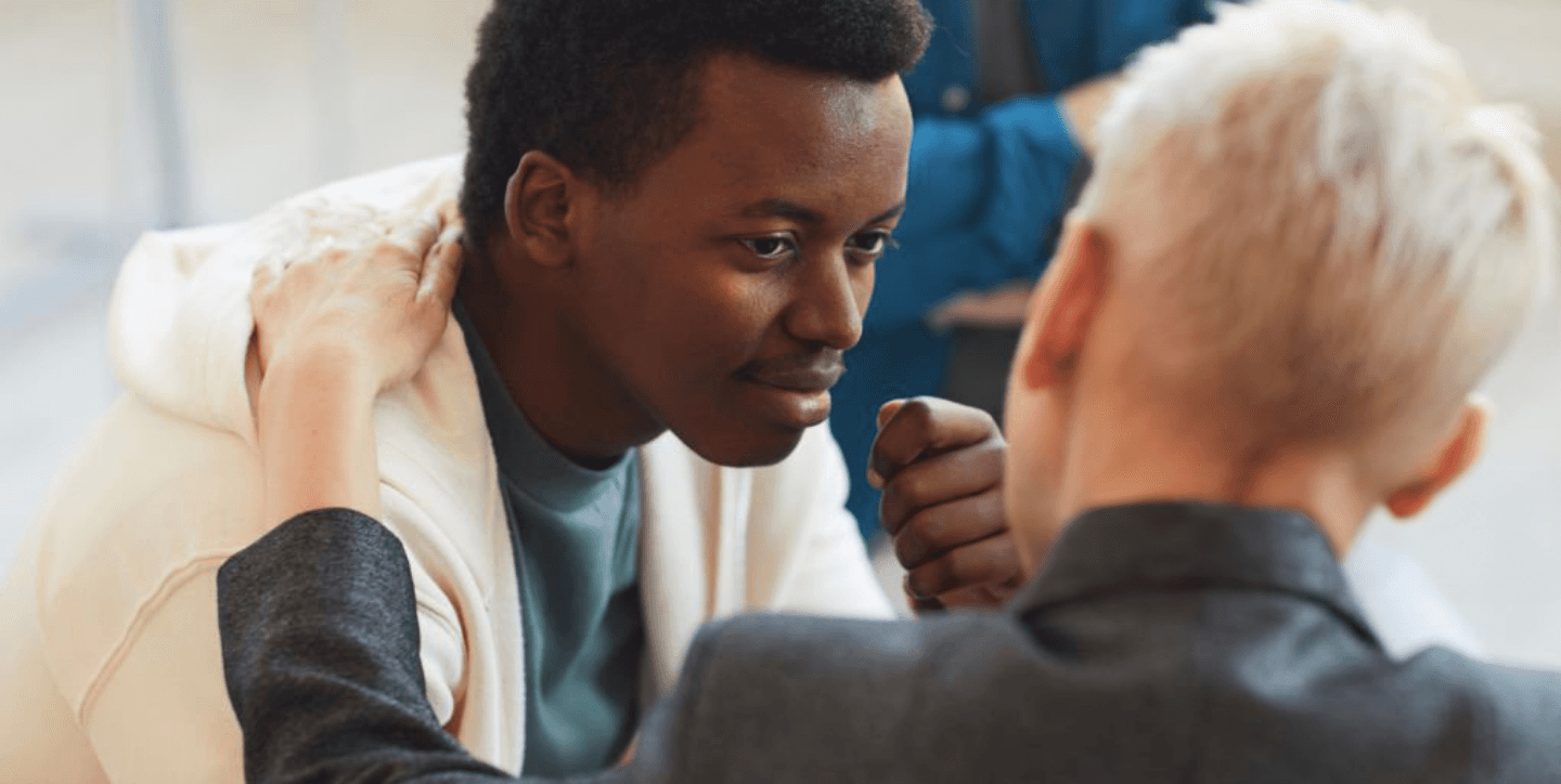 a black and white living room with a large tv